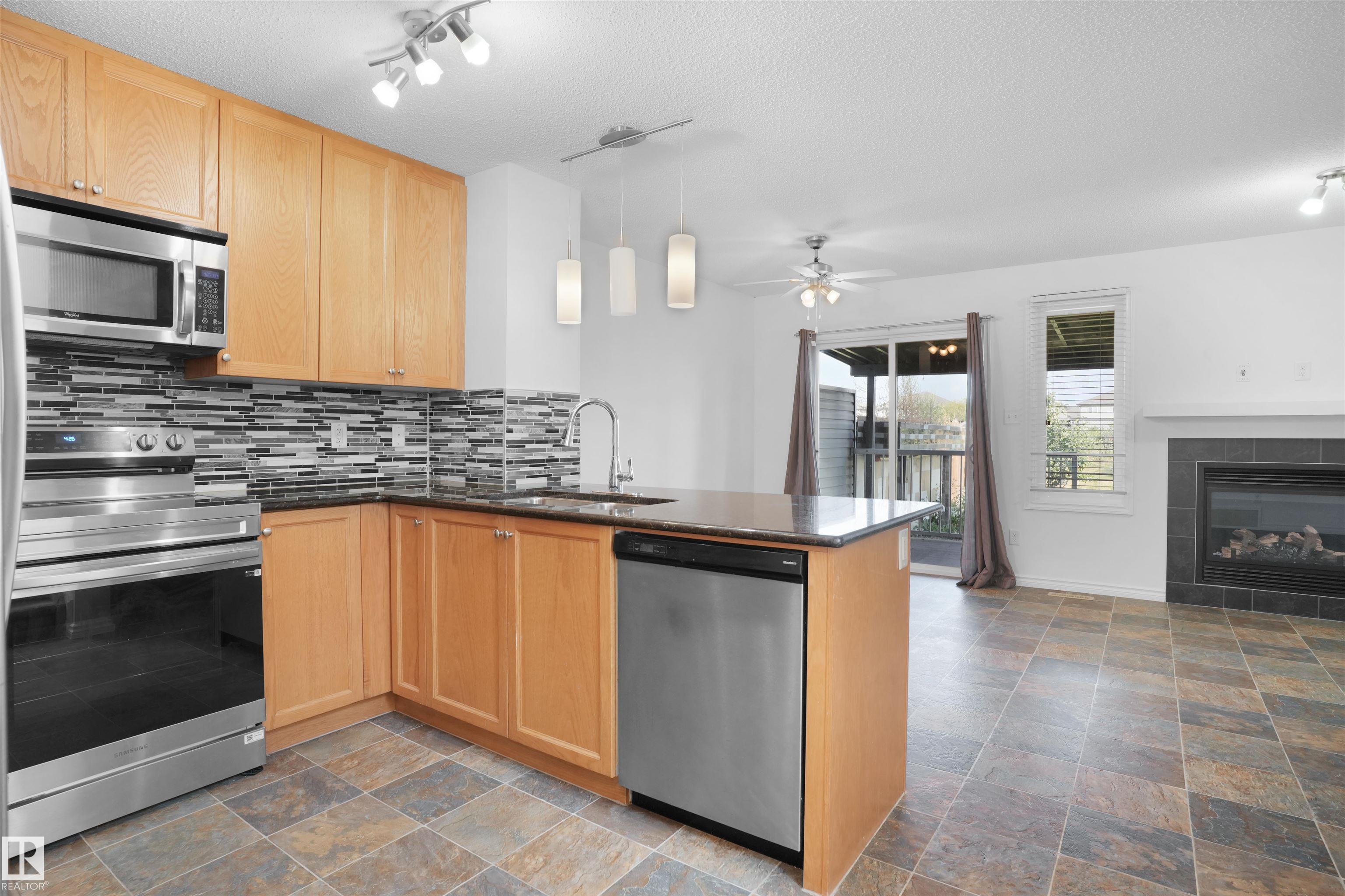 Photo 4 at 1813 28 Street NW, Laurel, Edmonton