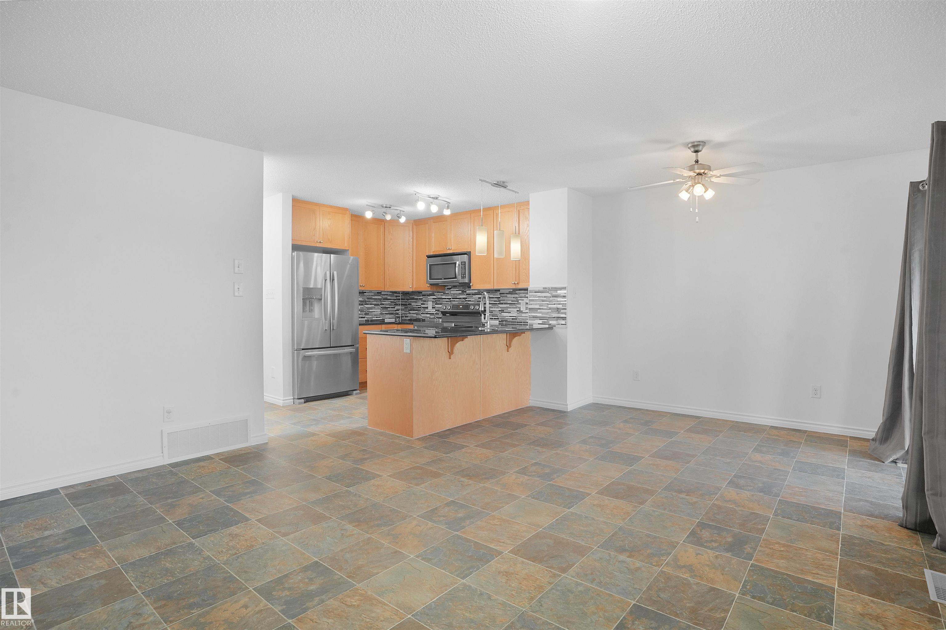 Photo 9 at 1813 28 Street NW, Laurel, Edmonton