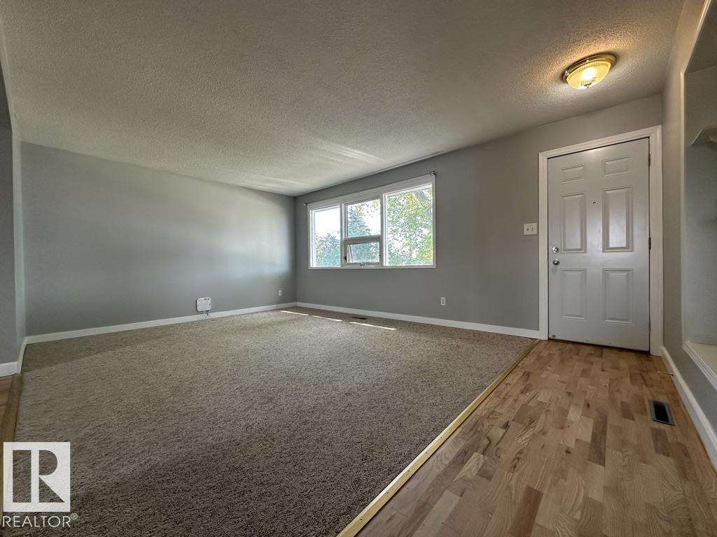 Photo 3 at 9512/9514 128 Avenue NW, Killarney, Edmonton