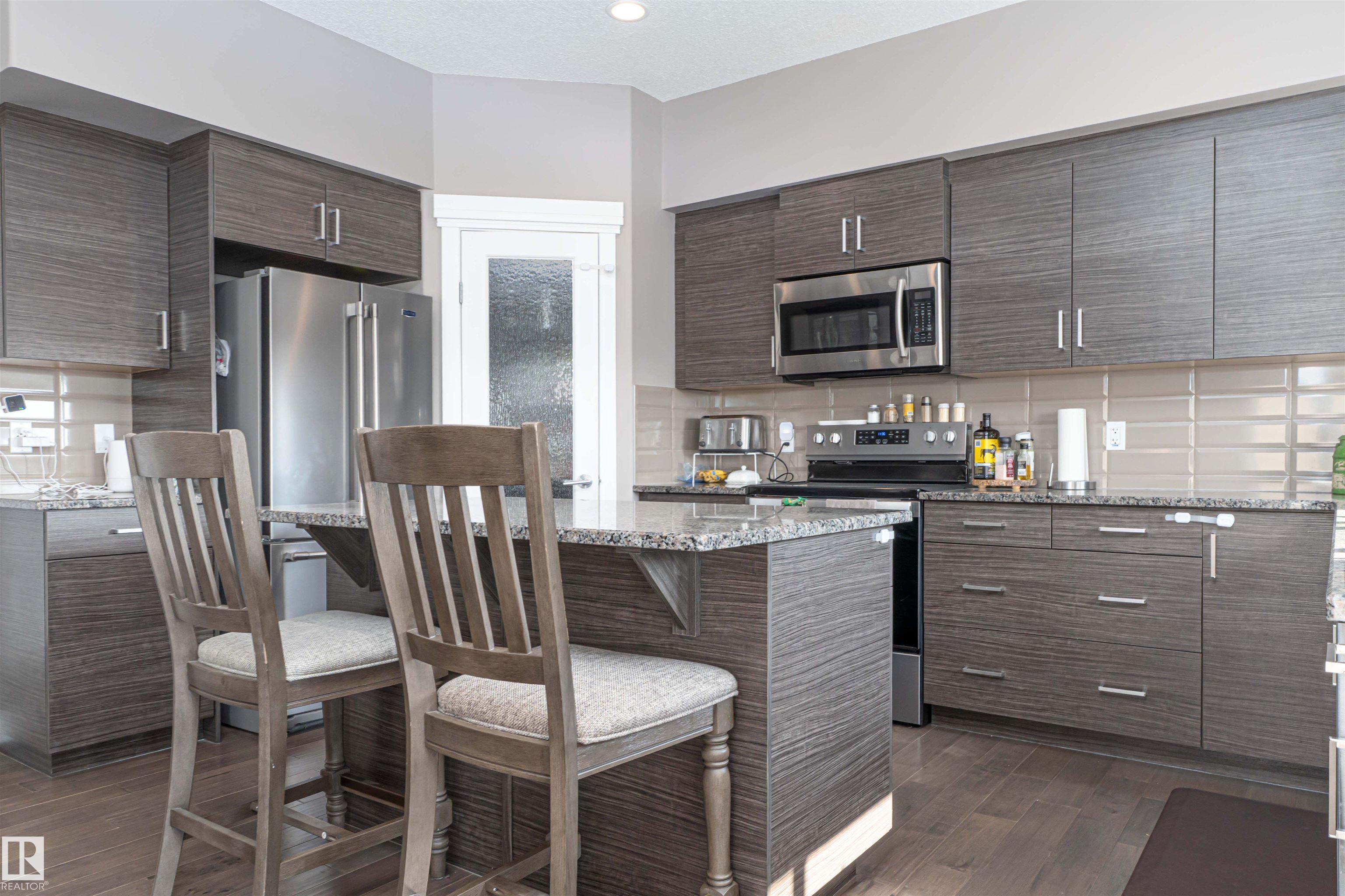 Photo 15 at 45 Sandalwood Place, Suntree, Leduc