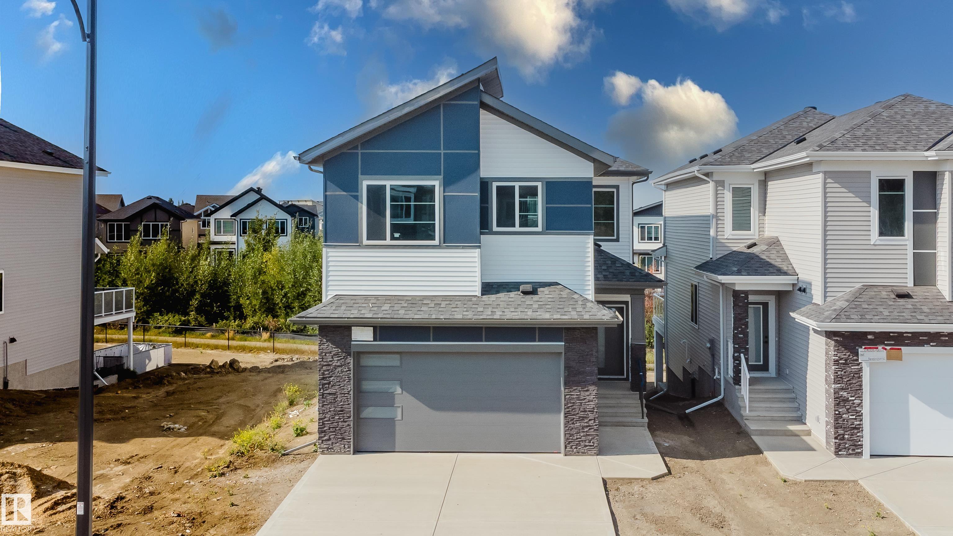 Photo 2 at 69 Meadowgrove Lane, McLaughlin, Spruce Grove