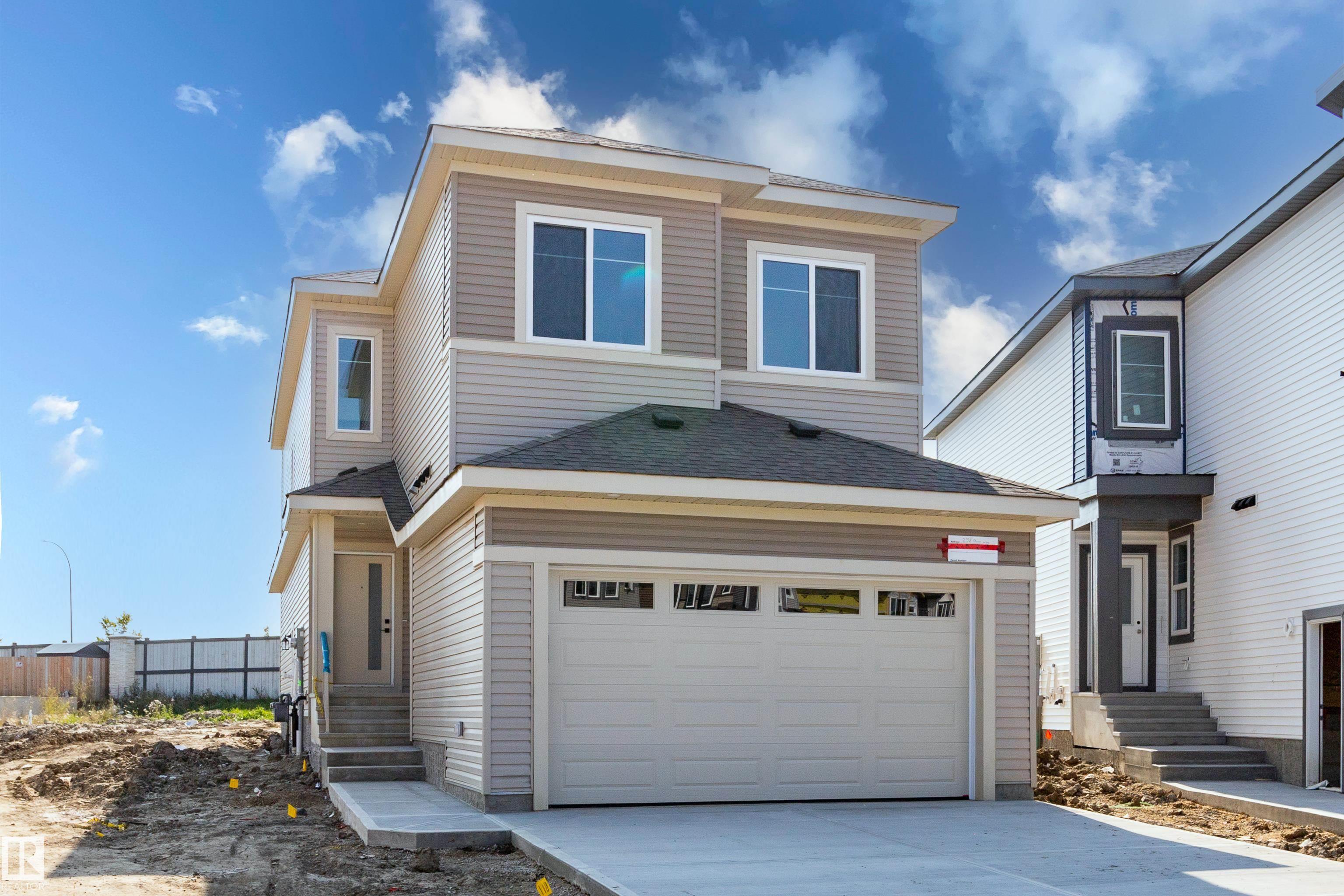 Photo 2 at 298 Munn Way, Meadowview Park, Leduc