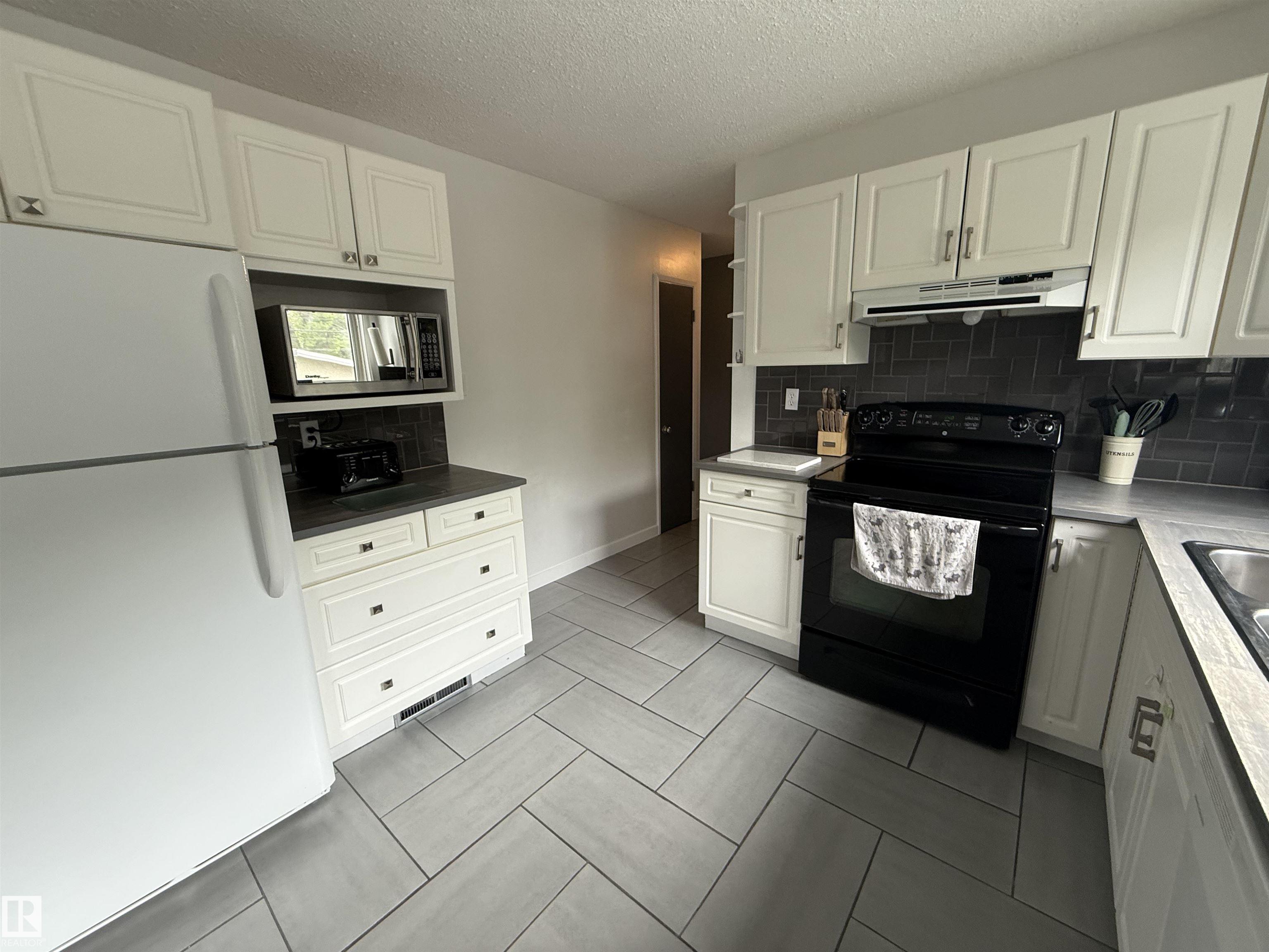 Photo 2 at 40 Garden Crescent, Grandin, St. Albert