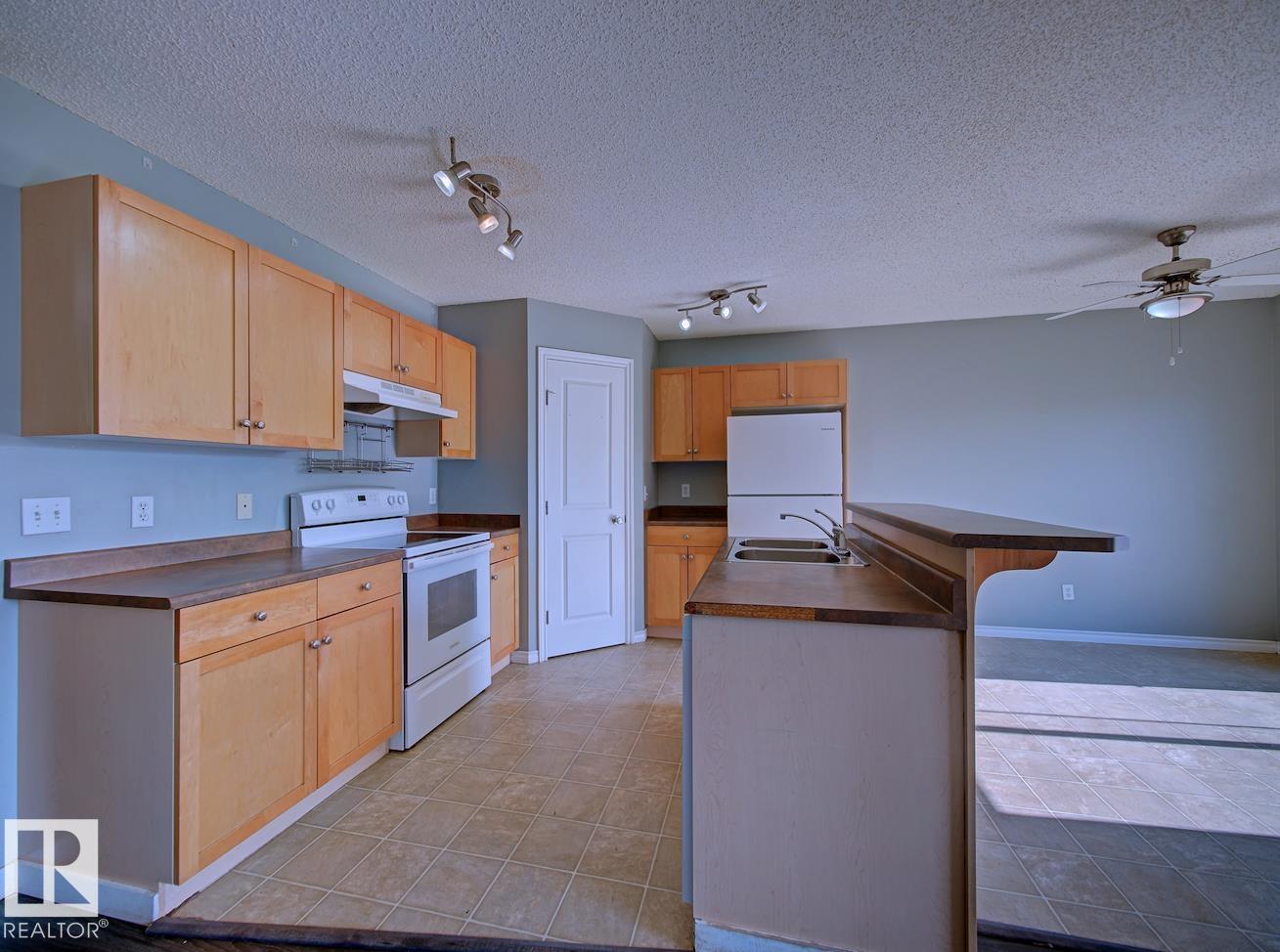 Photo 10 at 147 Westwood Lane, Westpark, Fort Saskatchewan