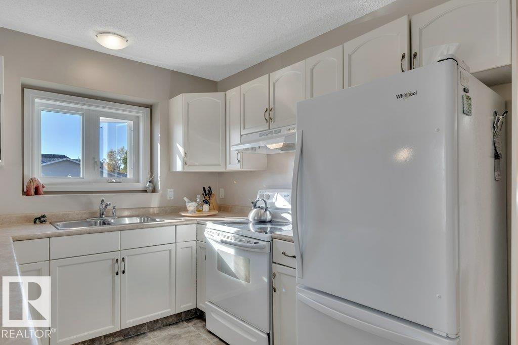 Photo 24 at 99 Meadowview Drive, Meadowview Park, Leduc