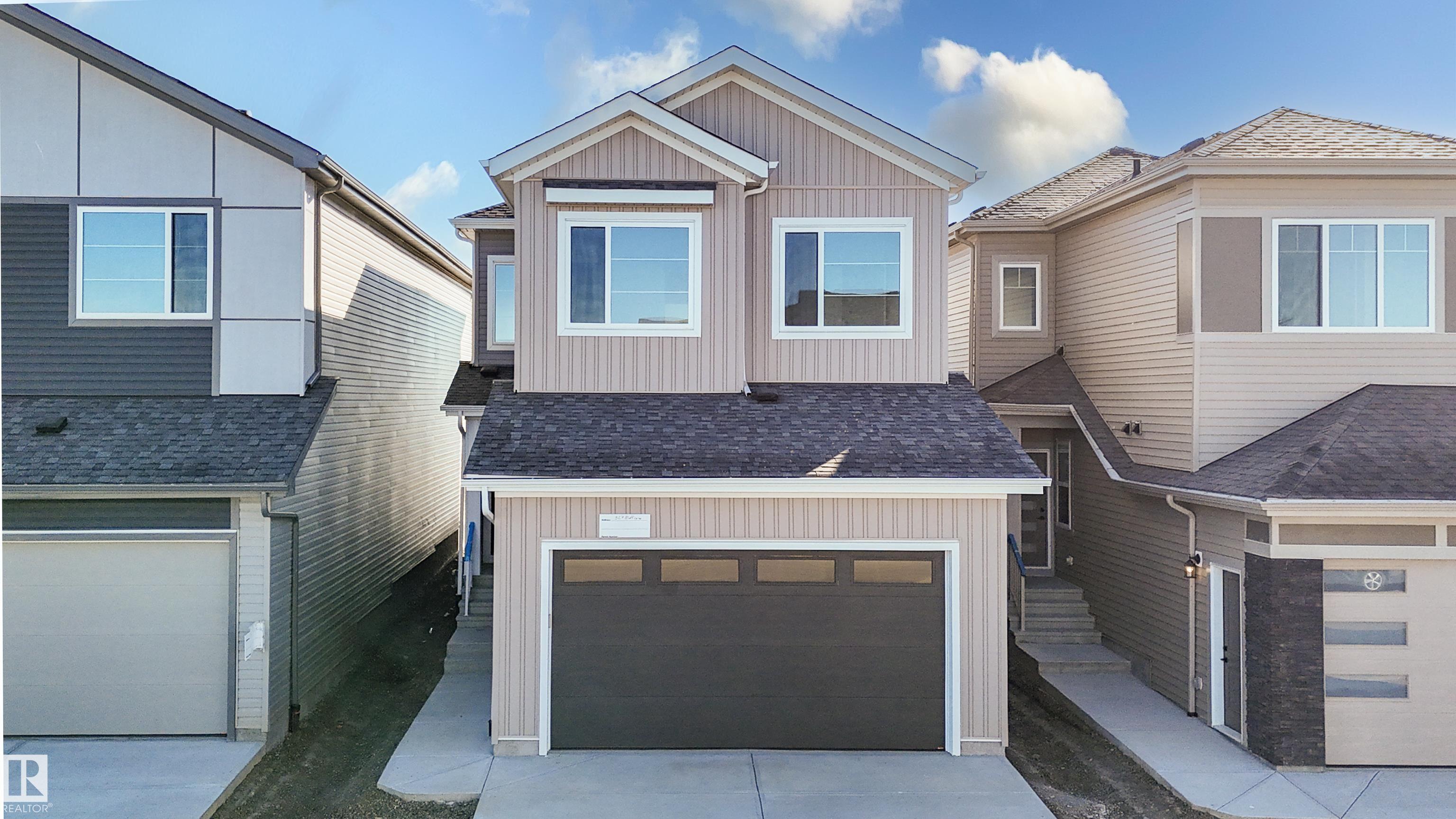 Photo 2 at 327 Bluff Cove, Black Stone, Leduc