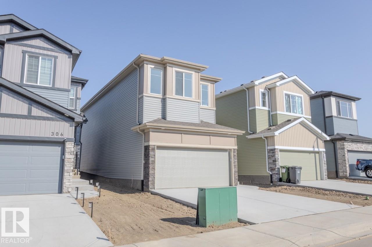 Photo 3 at 304 Juniper Cove, Woodbend, Leduc