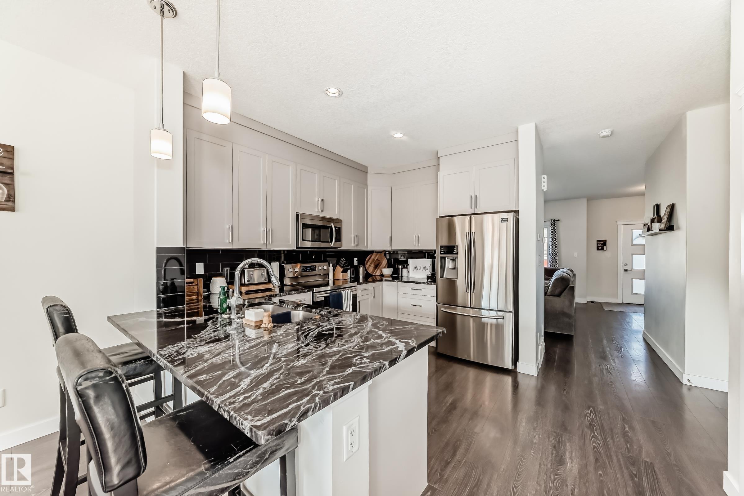 Photo 12 at 725 Berg Loop, Black Stone, Leduc