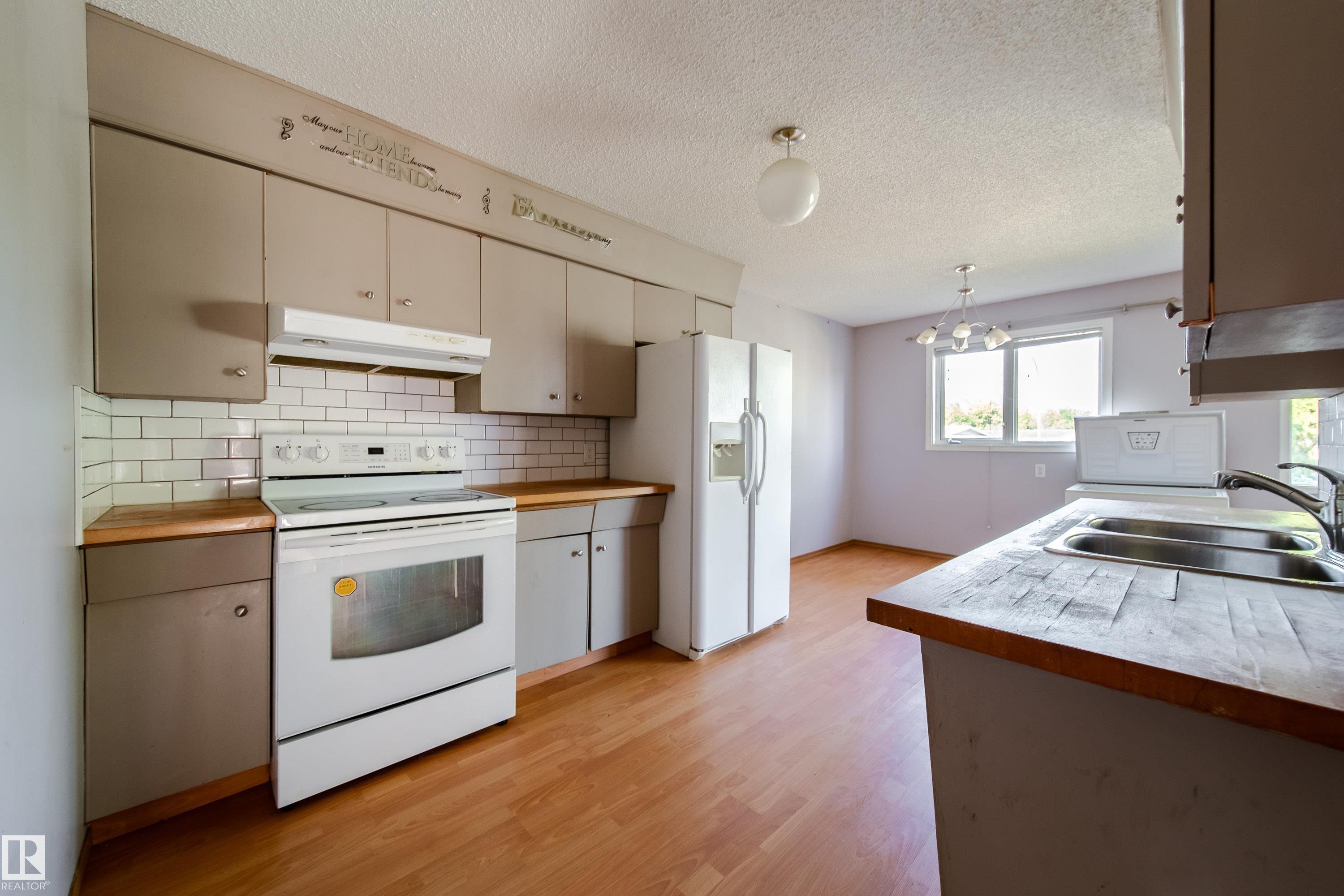 Photo 5 at 3119-3121 113 Avenue NW, Rundle Heights, Edmonton
