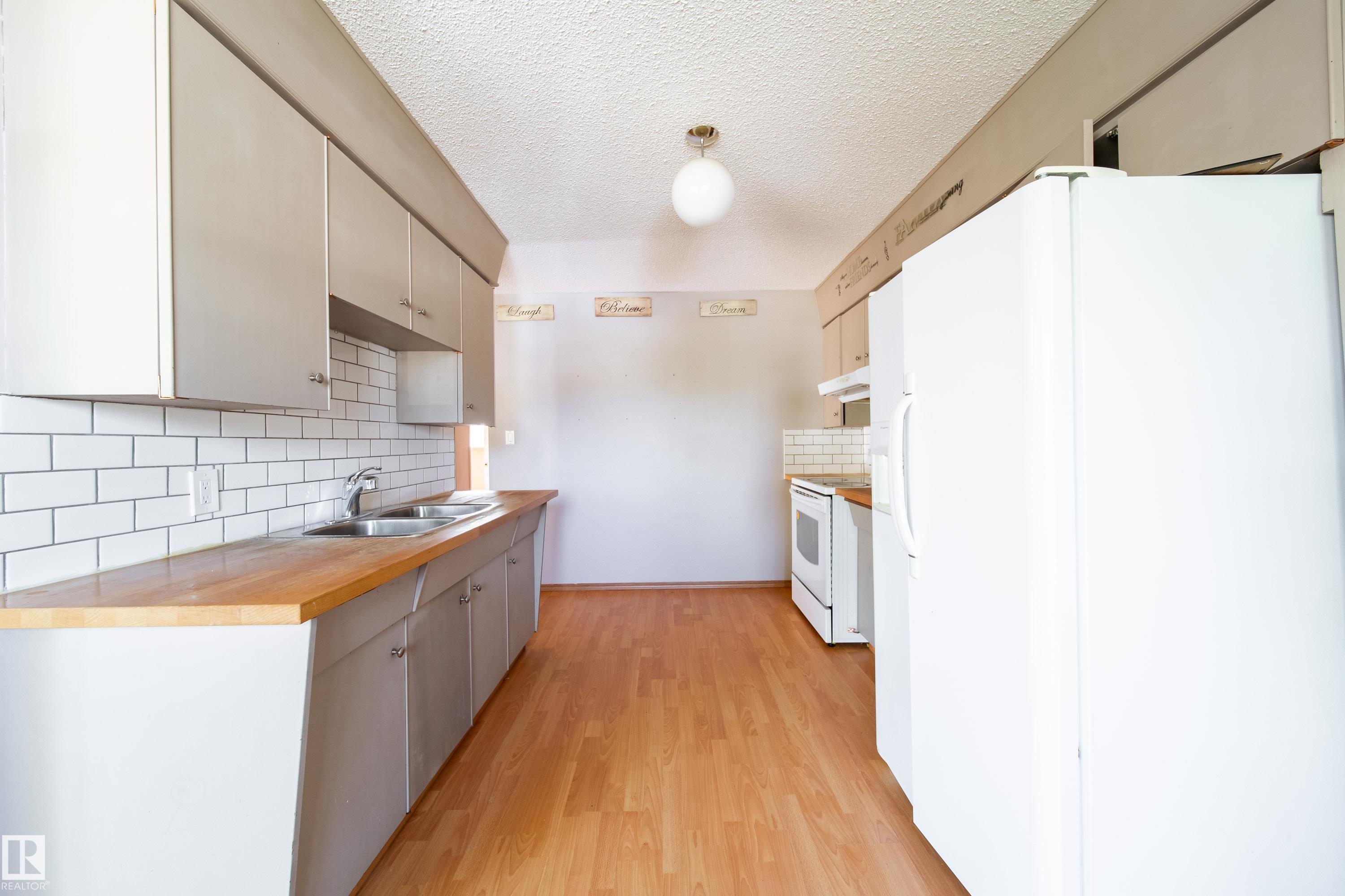Photo 8 at 3119-3121 113 Avenue NW, Rundle Heights, Edmonton