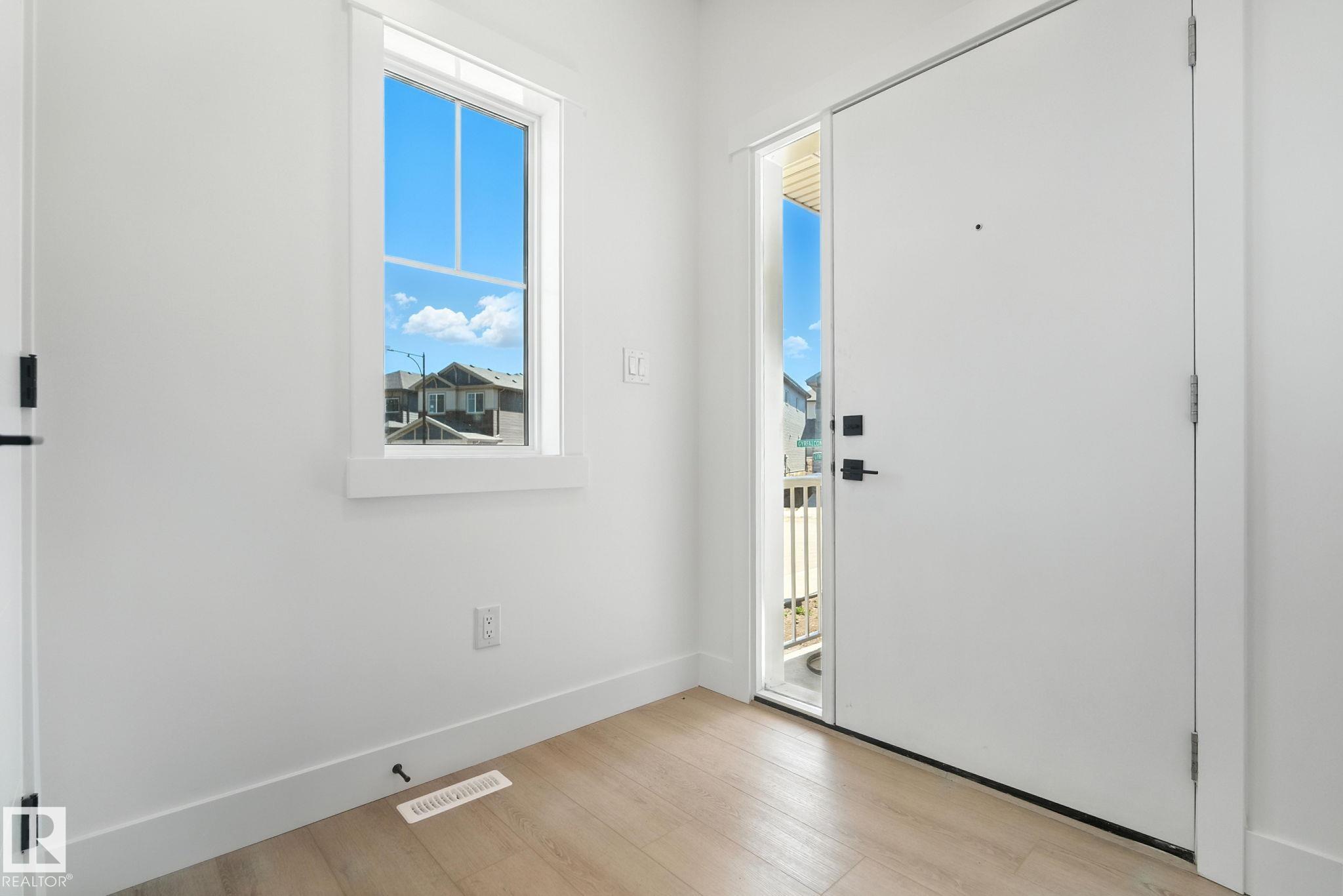 Photo 11 at 1135 Gyrfalcon Crescent NW, Hawks Ridge, Edmonton