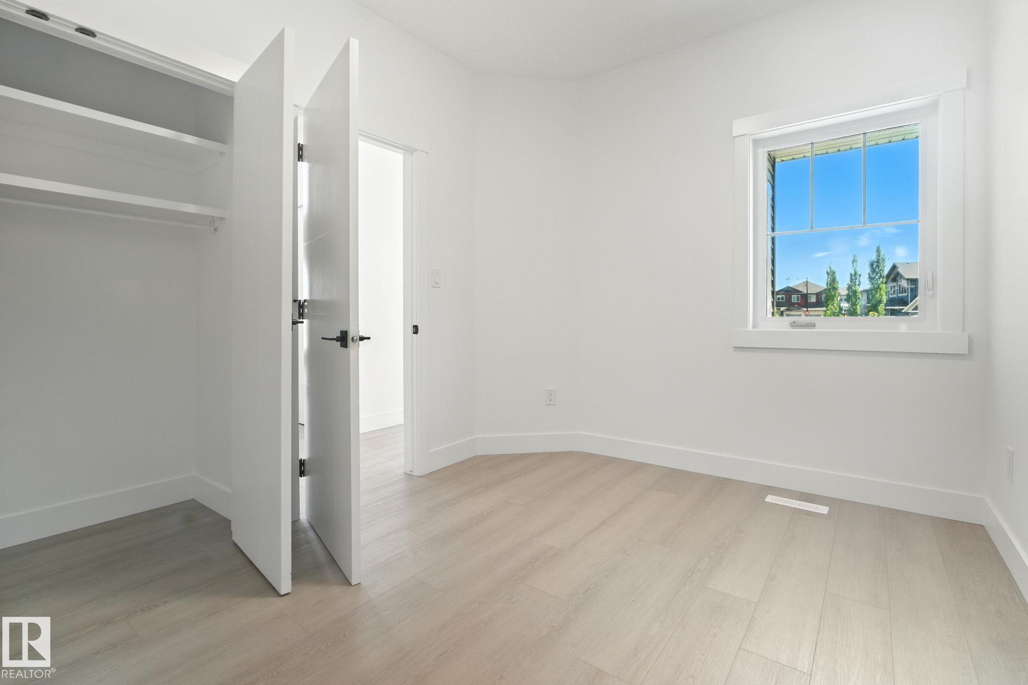 Photo 13 at 1135 Gyrfalcon Crescent NW, Hawks Ridge, Edmonton