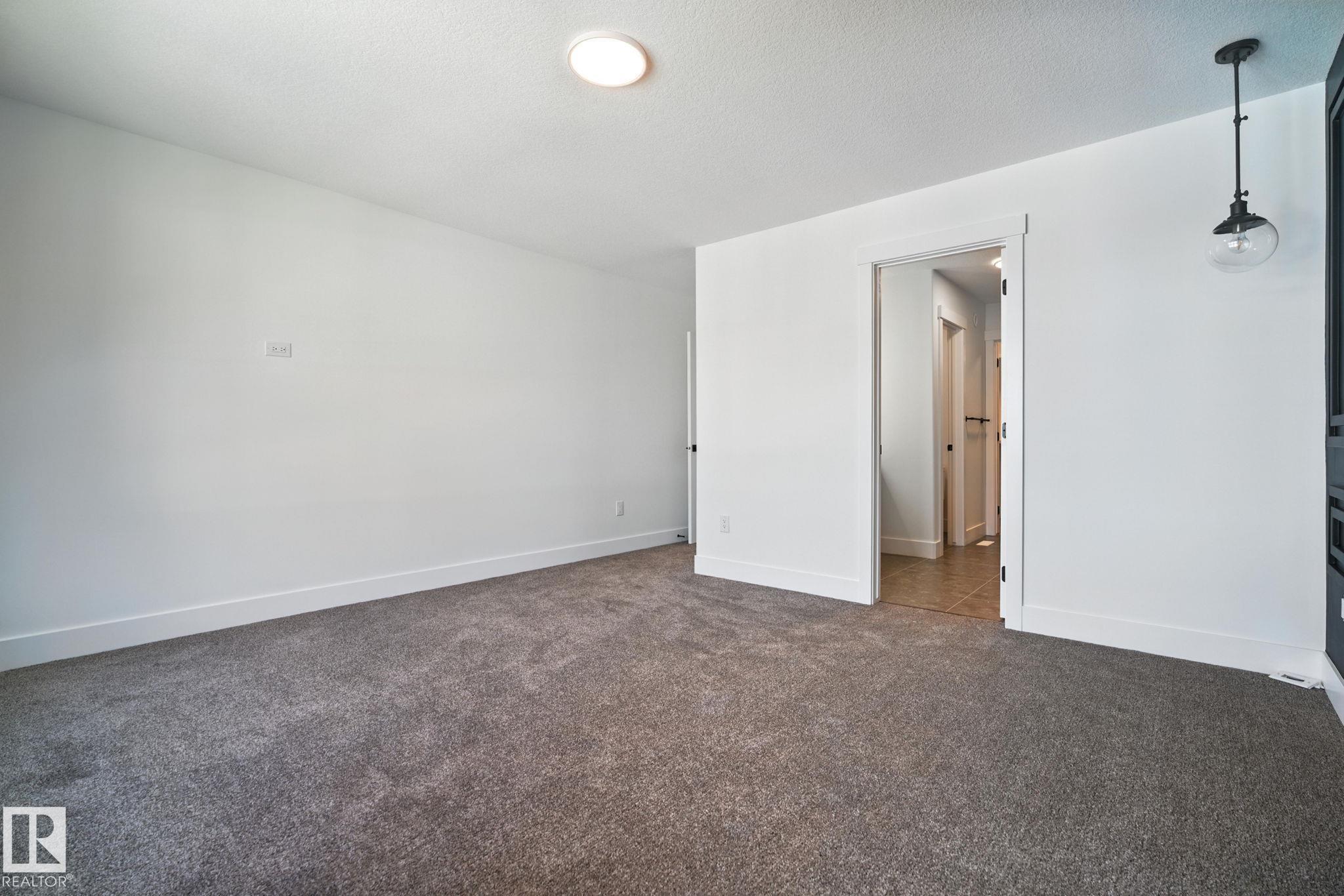 Photo 21 at 1135 Gyrfalcon Crescent NW, Hawks Ridge, Edmonton