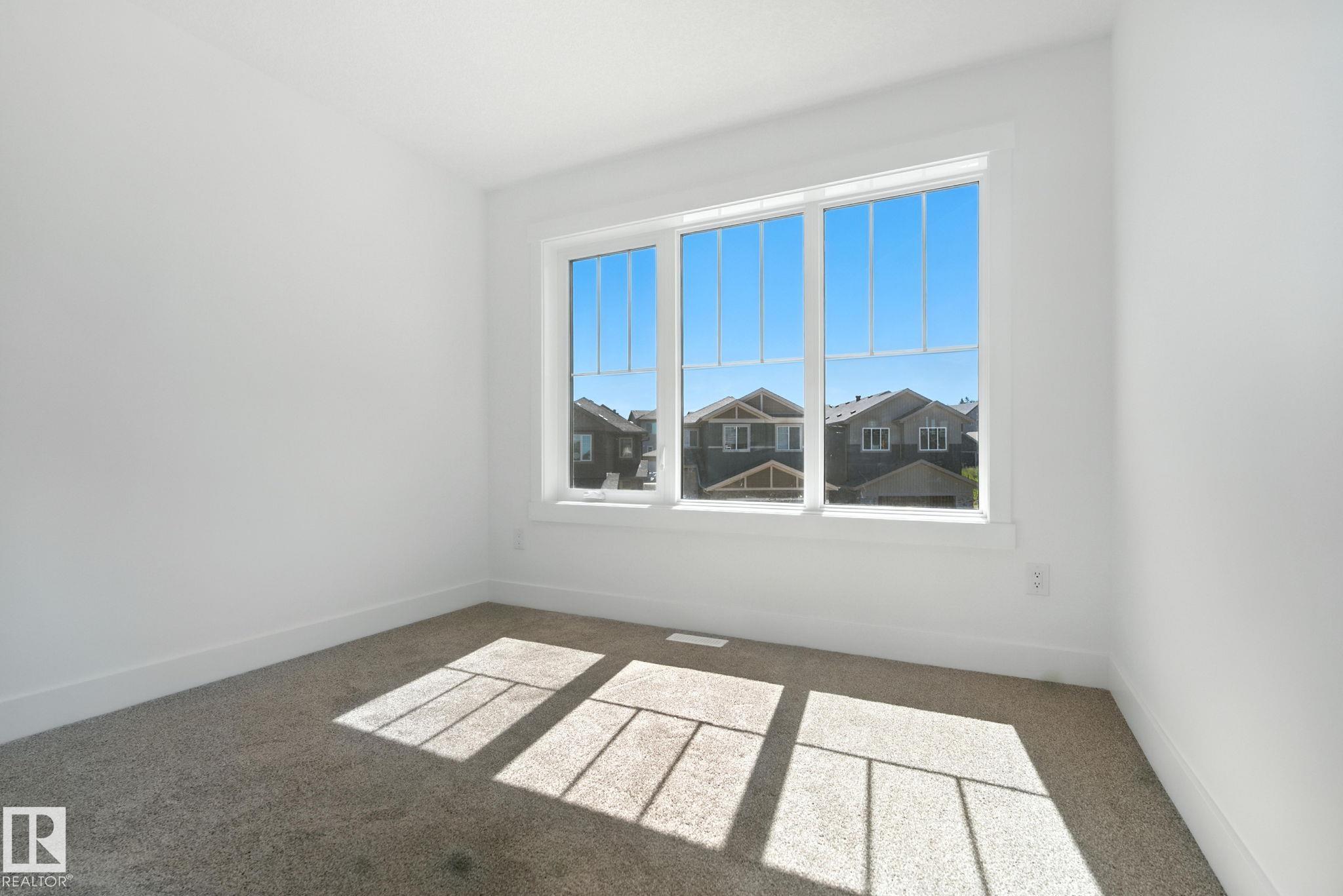 Photo 30 at 1135 Gyrfalcon Crescent NW, Hawks Ridge, Edmonton