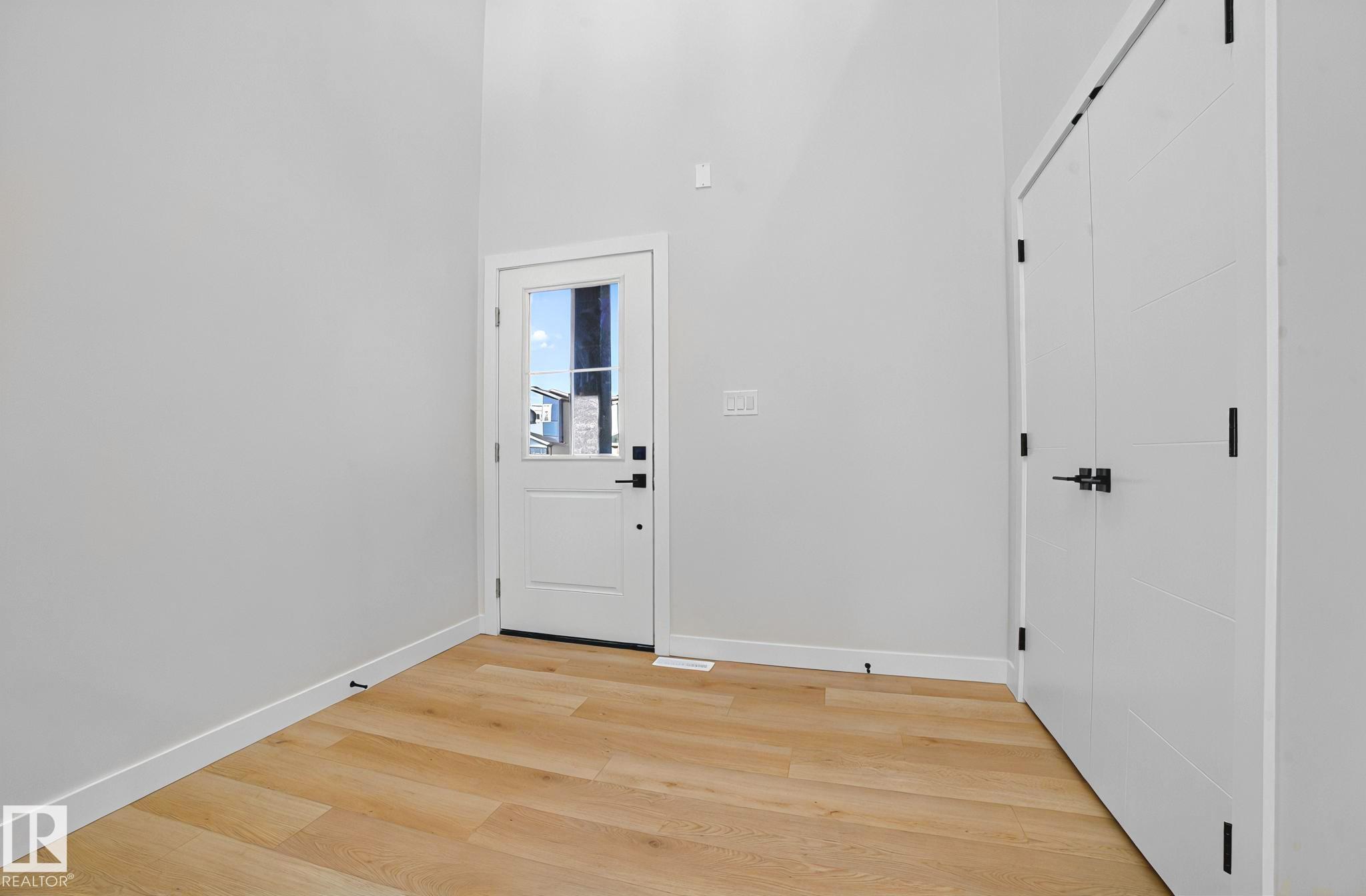 Photo 2 at 142 Larch Crescent, Woodbend, Leduc