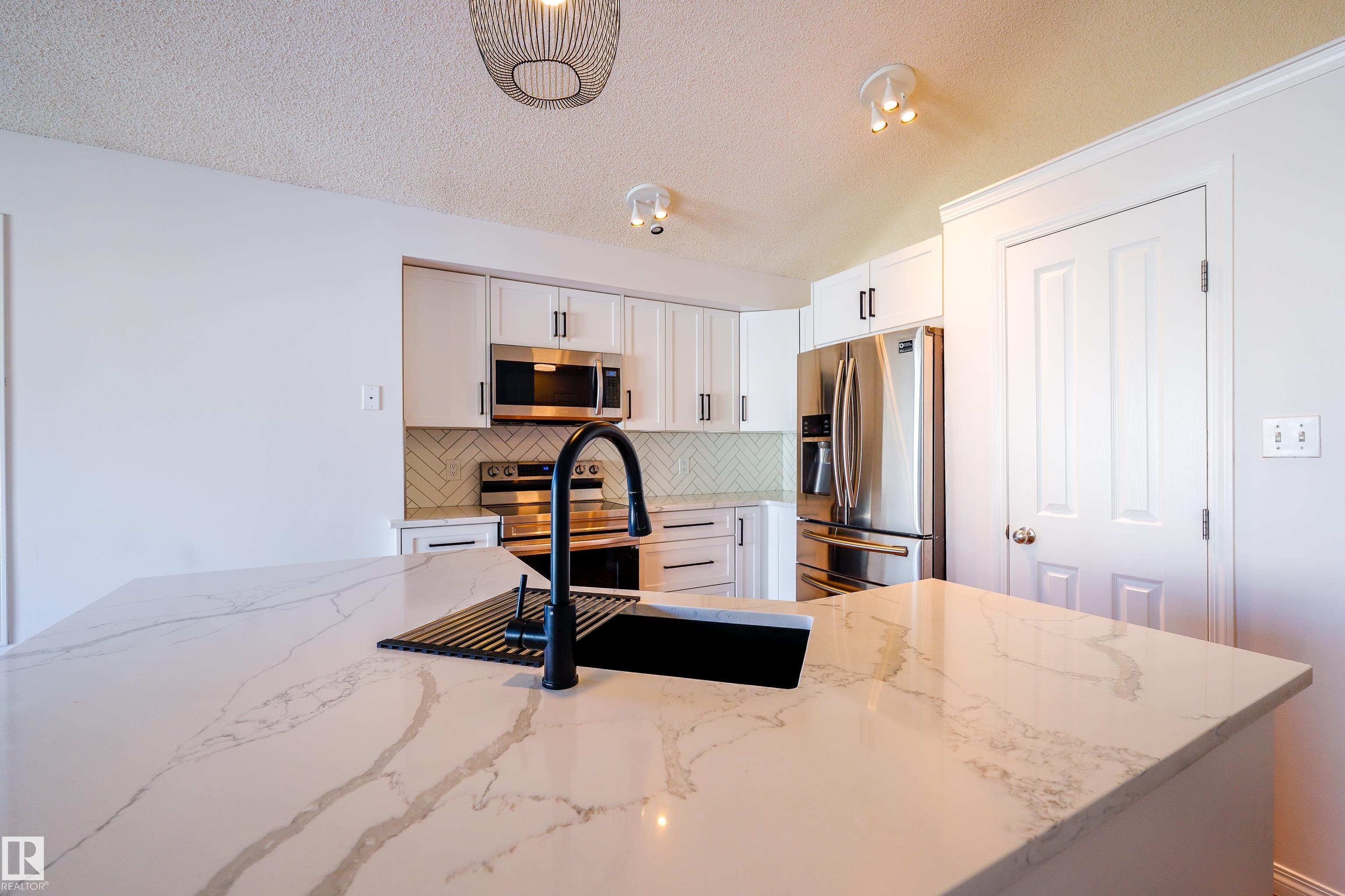 Photo 13 at 409 84 Street SW, Ellerslie, Edmonton