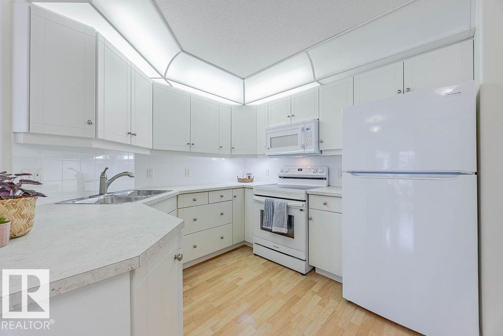 Photo 4 at 102 - 9008 99 Avenue NW, Riverdale, Edmonton