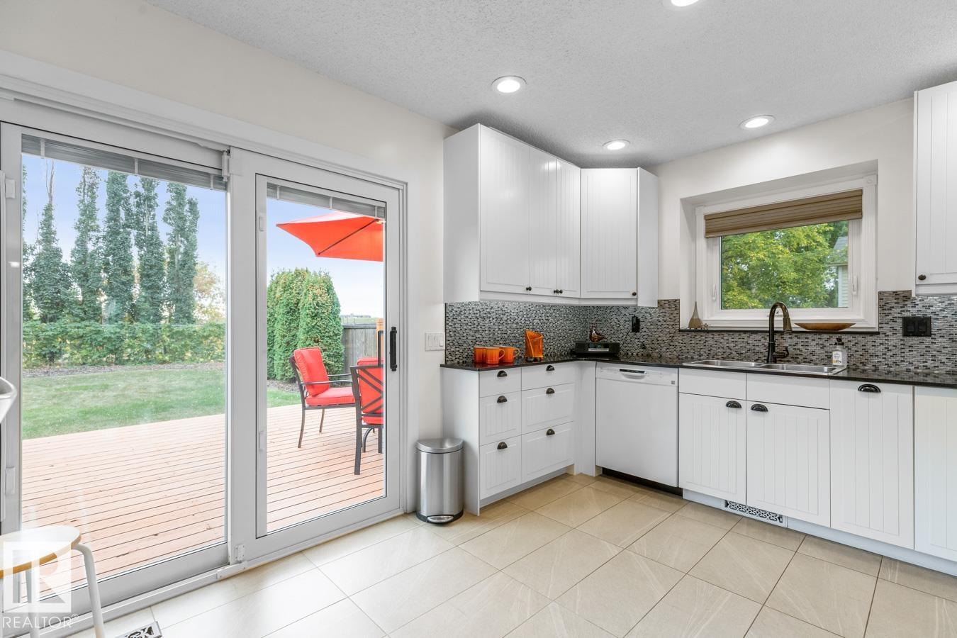 Photo 2 at 4631 10 Avenue NW, Crawford Plains, Edmonton
