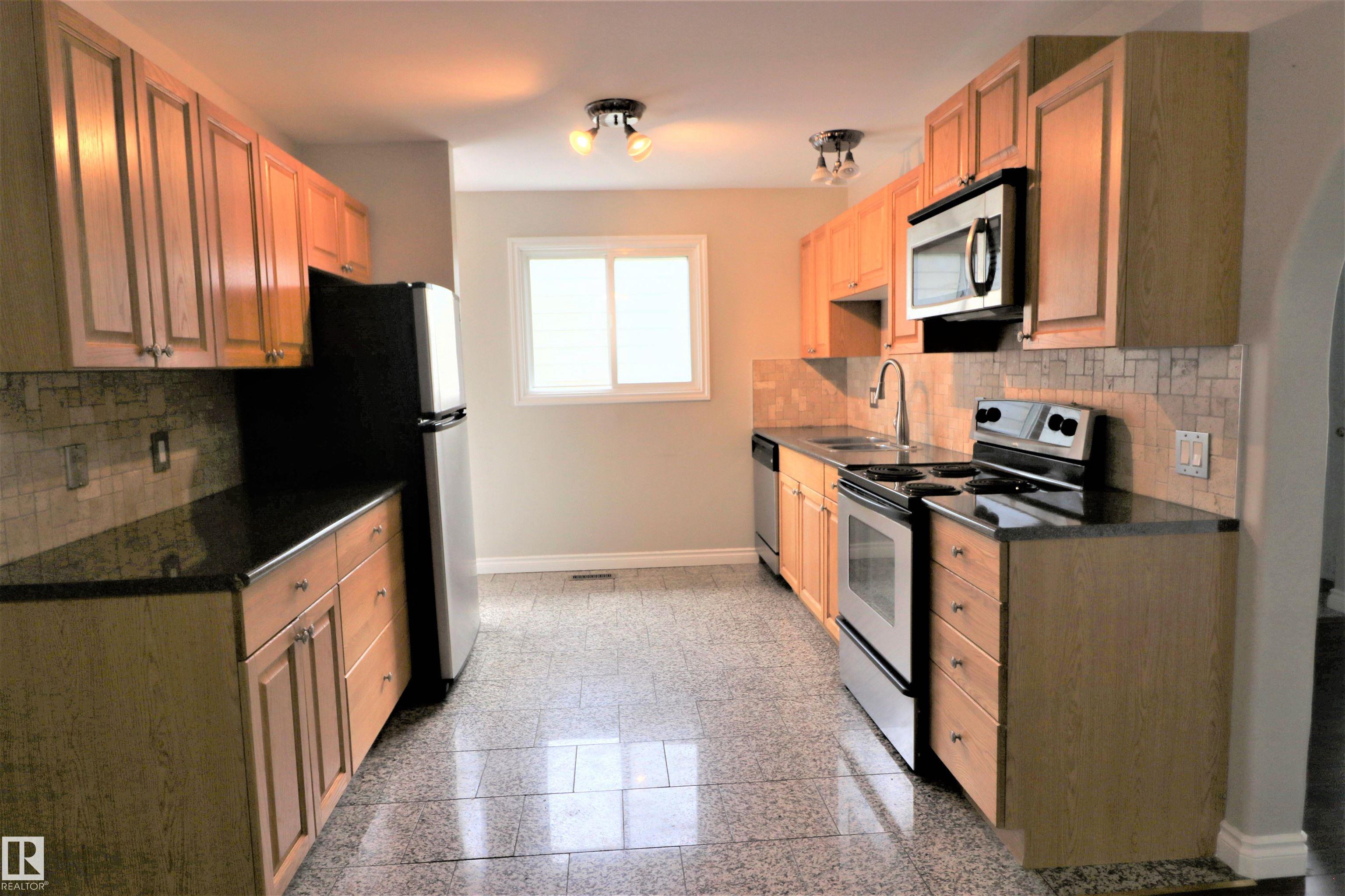 Photo 3 at 4317 54 Street, Parklane, Beaumont