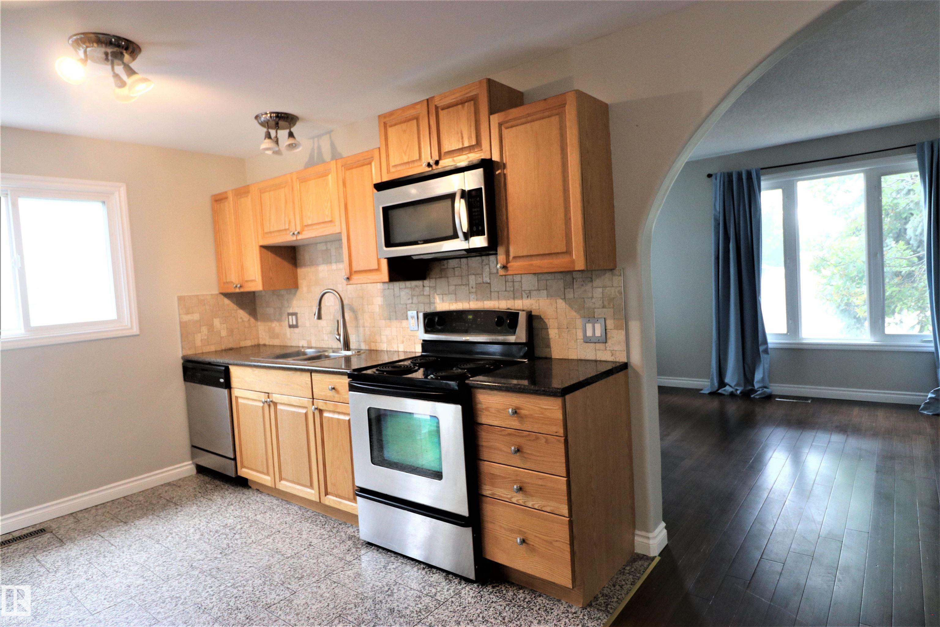 Photo 4 at 4317 54 Street, Parklane, Beaumont