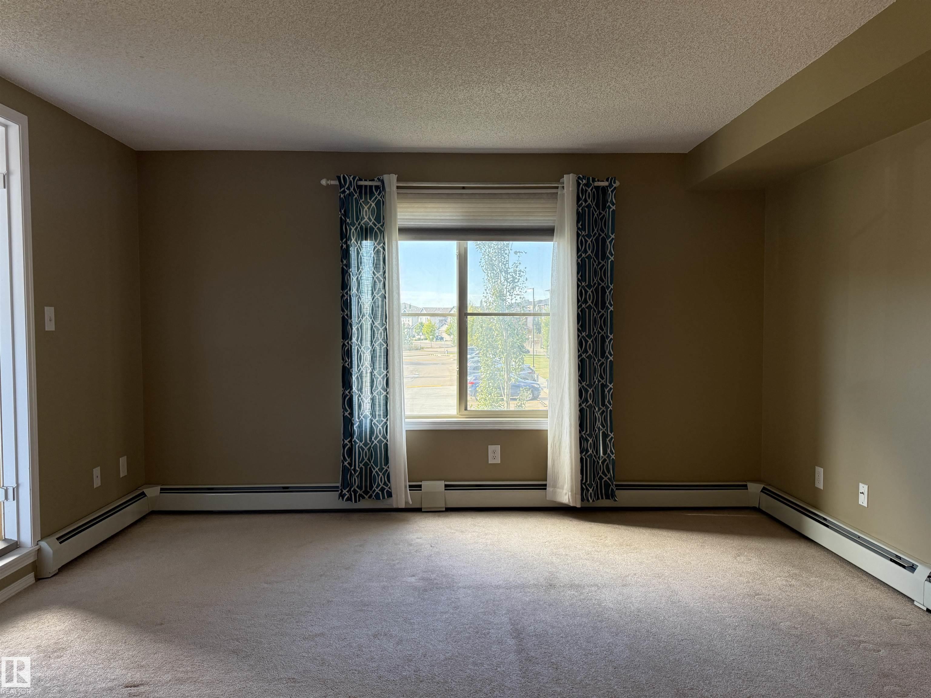 Photo 5 at 214 - 274 Mcconachie Drive NW, McConachie Area, Edmonton
