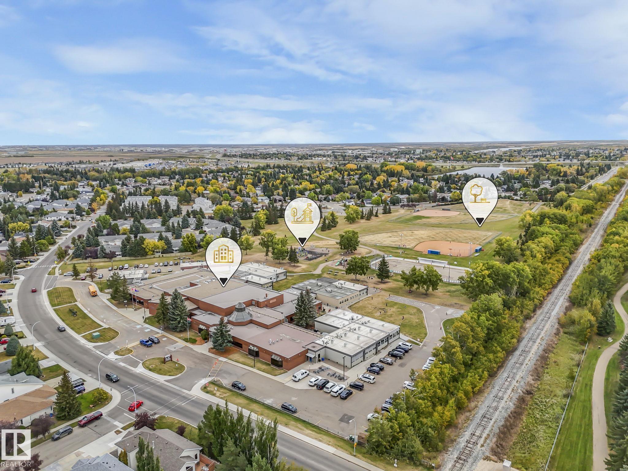 Photo 73 at 63 Woods Place, Windrose, Leduc