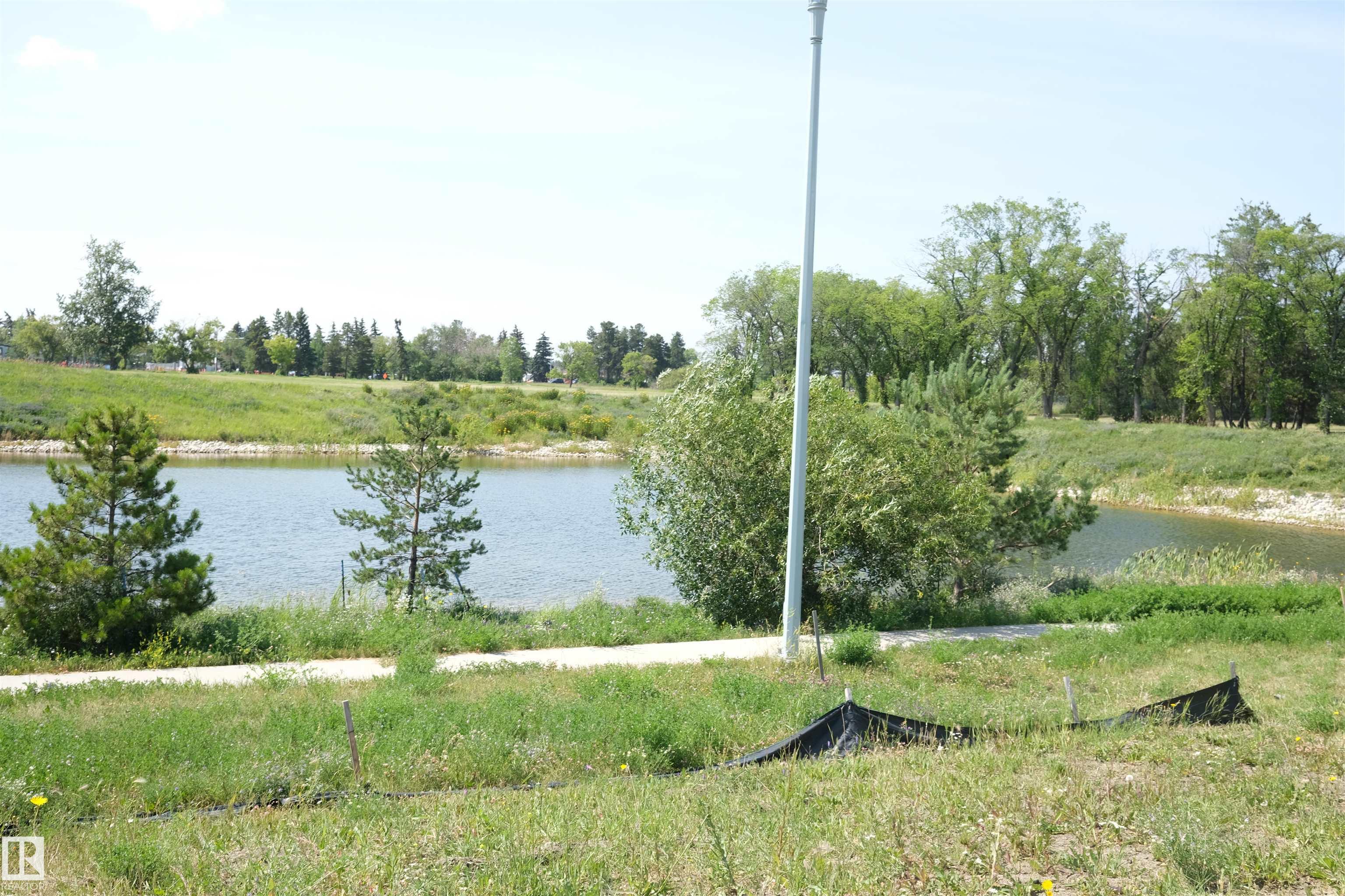 Photo 8 at 9235 156 Avenue NW, Eaux Claires, Edmonton