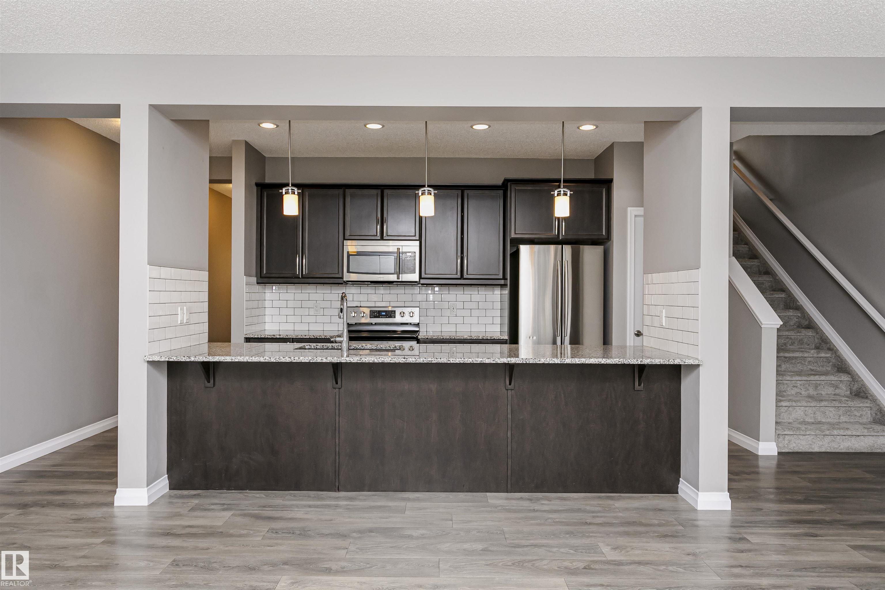 Photo 12 at 409 Simpkins Wynd, Southfork, Leduc