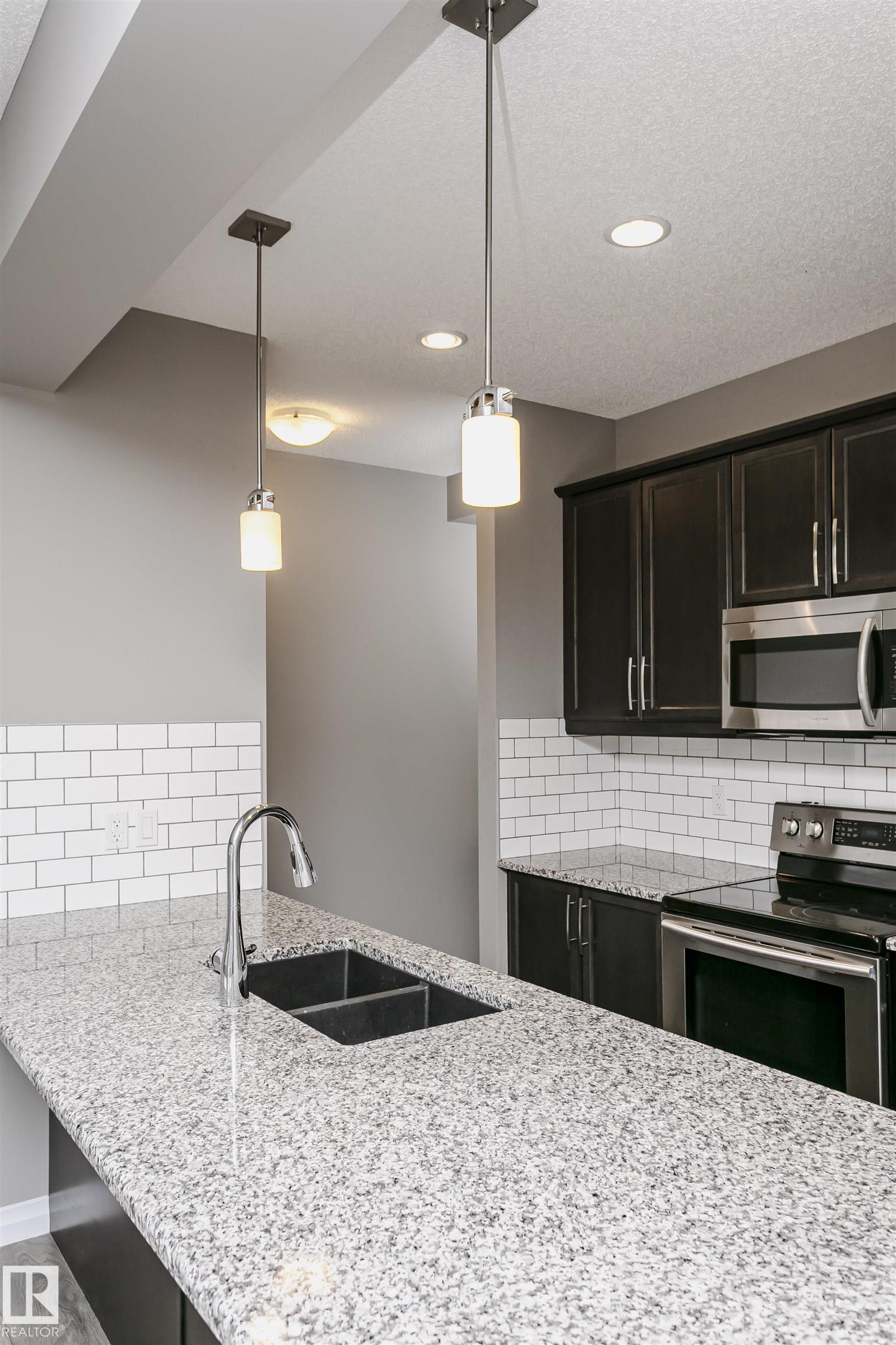 Photo 13 at 409 Simpkins Wynd, Southfork, Leduc