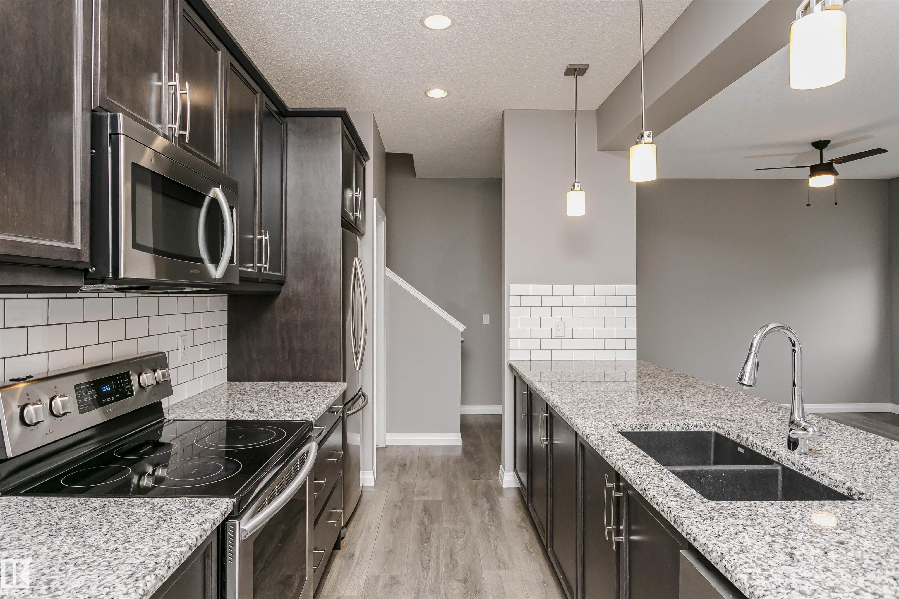 Photo 9 at 409 Simpkins Wynd, Southfork, Leduc
