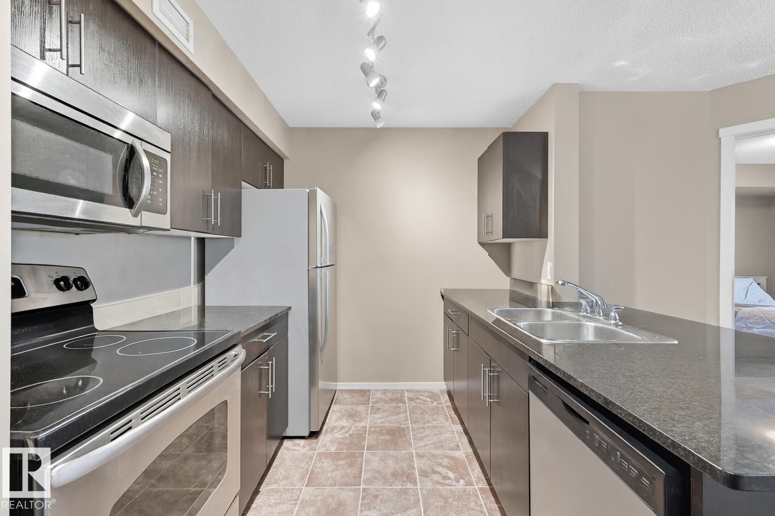 Photo 6 at 205 - 5810 Mullen Place NW, MacTaggart, Edmonton