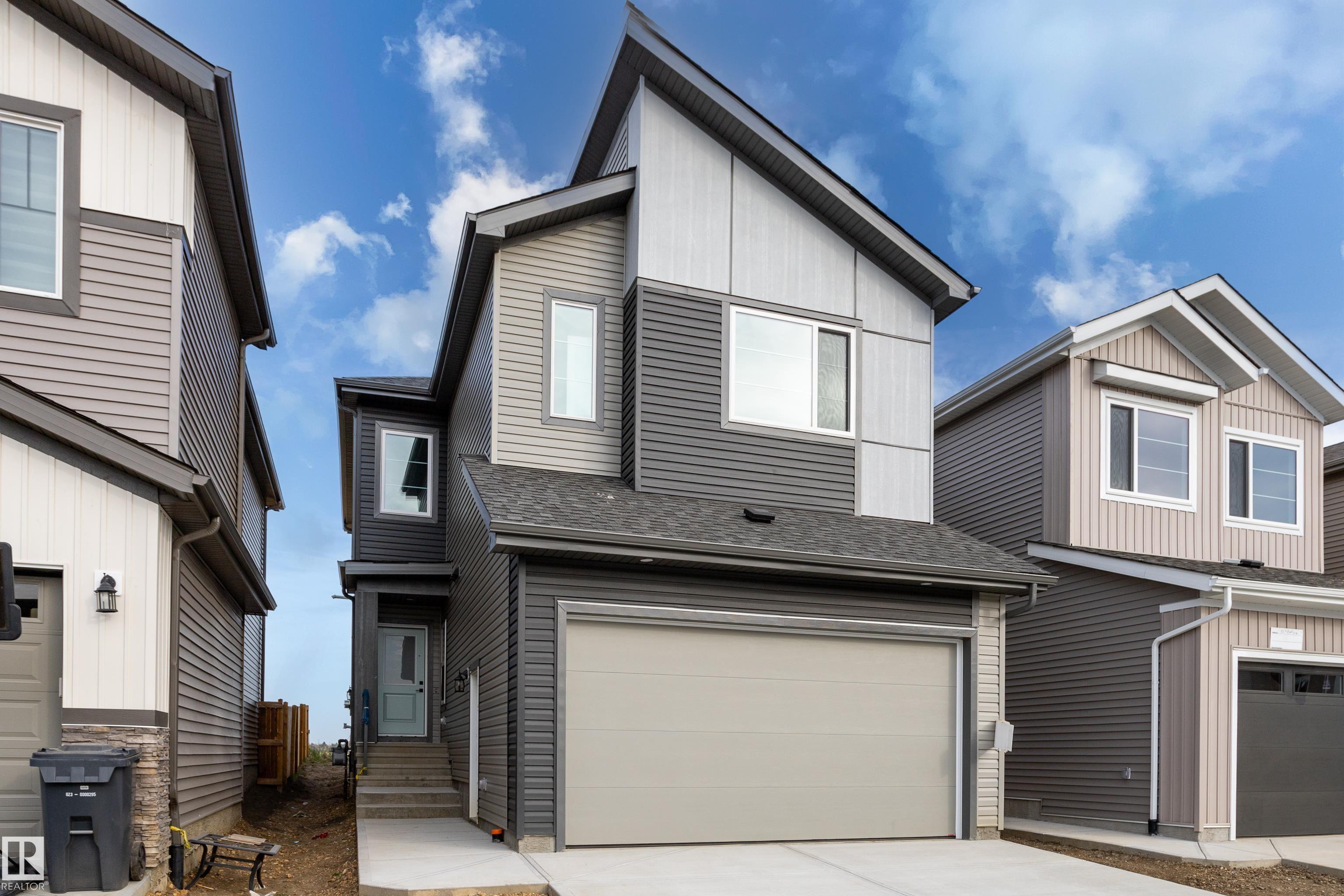 Photo 2 at 325 Bluff Cove, Black Stone, Leduc