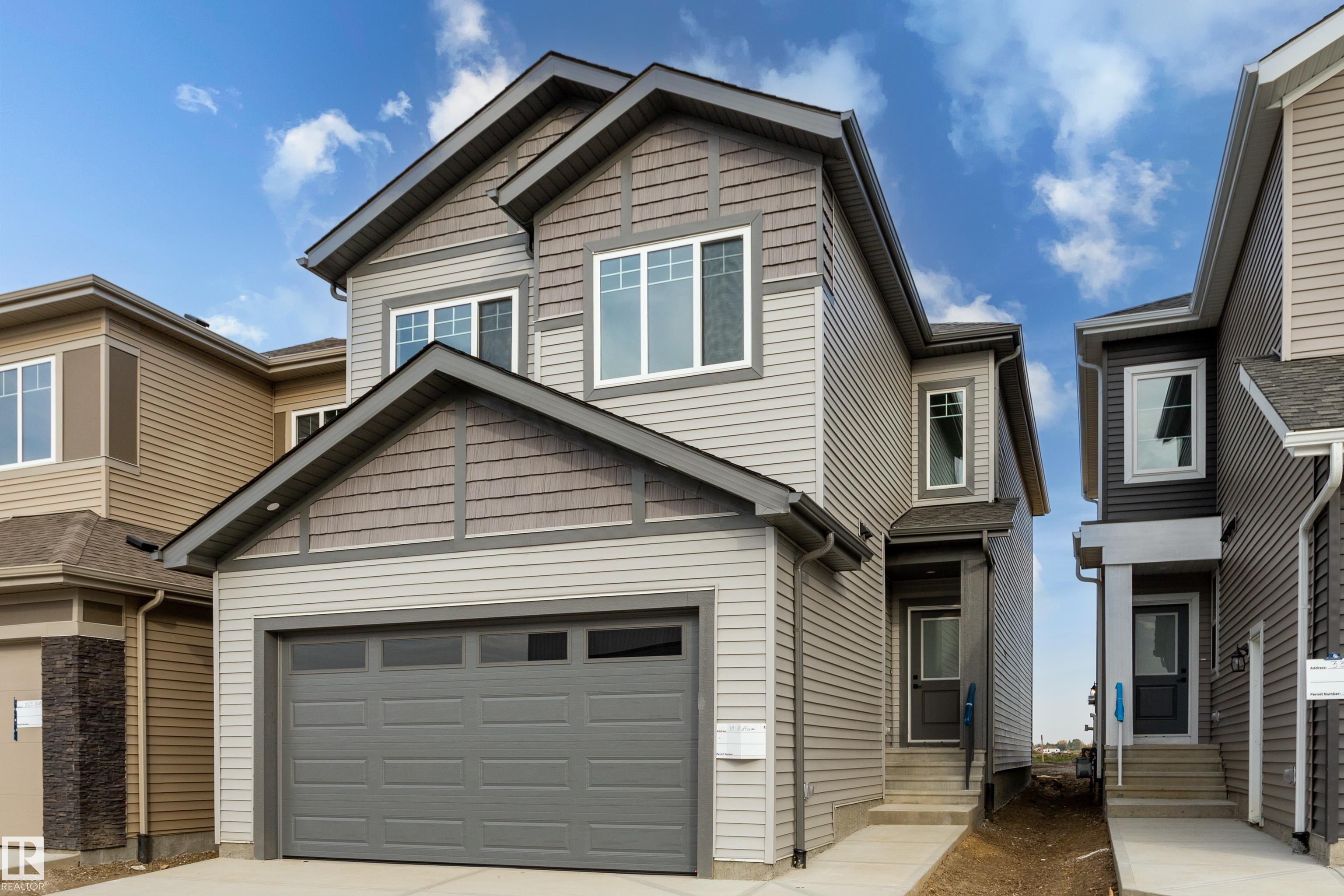 Photo 2 at 331 Bluff Cove, Black Stone, Leduc