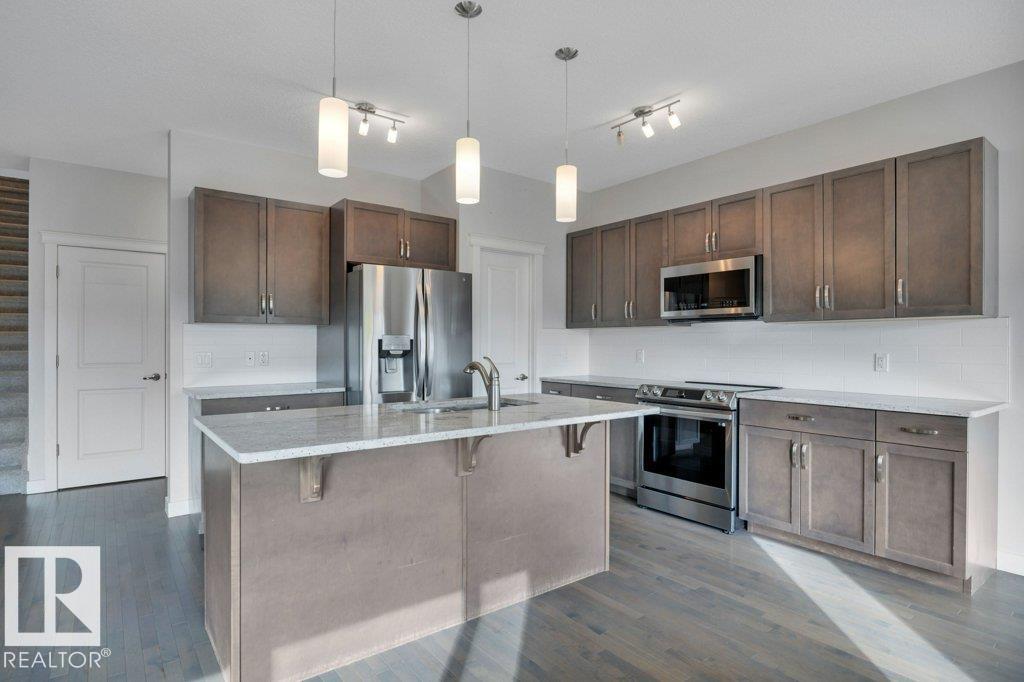 Photo 13 at 198 Meadowview Drive, Meadowview Park, Leduc