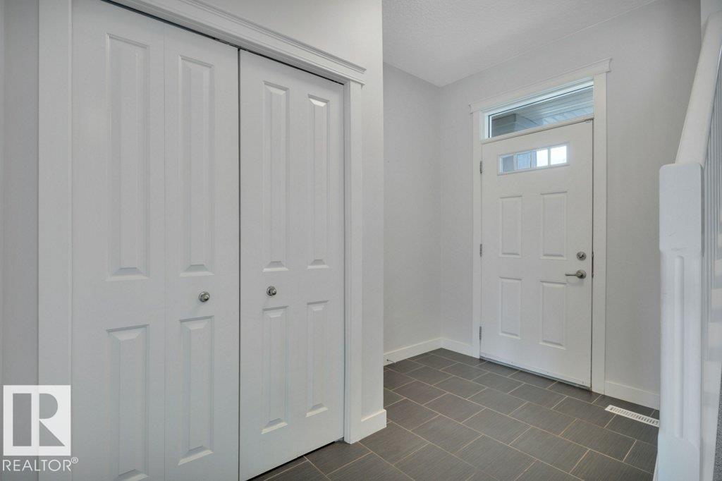 Photo 5 at 198 Meadowview Drive, Meadowview Park, Leduc