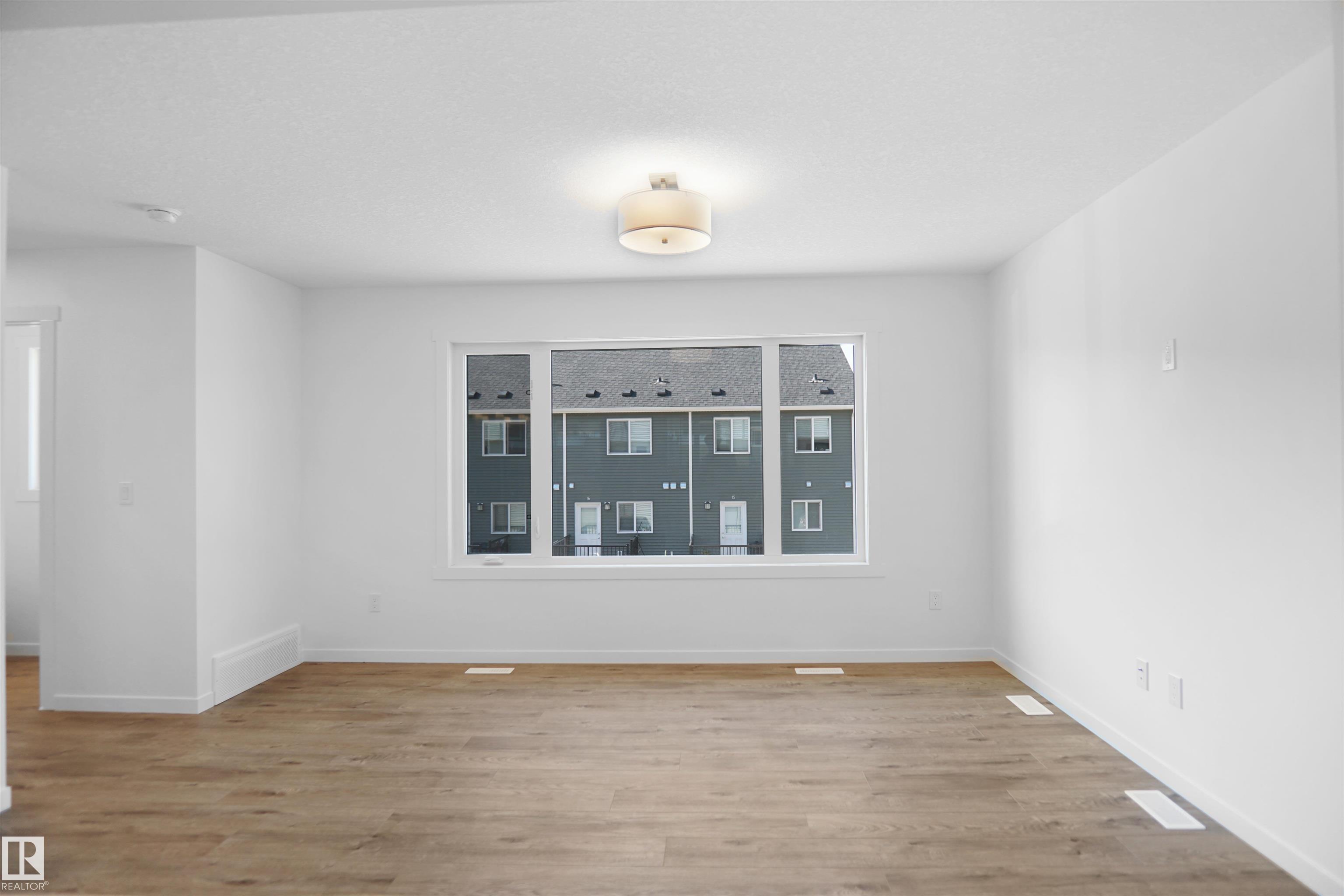 Photo 3 at 59 - 525 Secord Boulevard NW, Secord, Edmonton