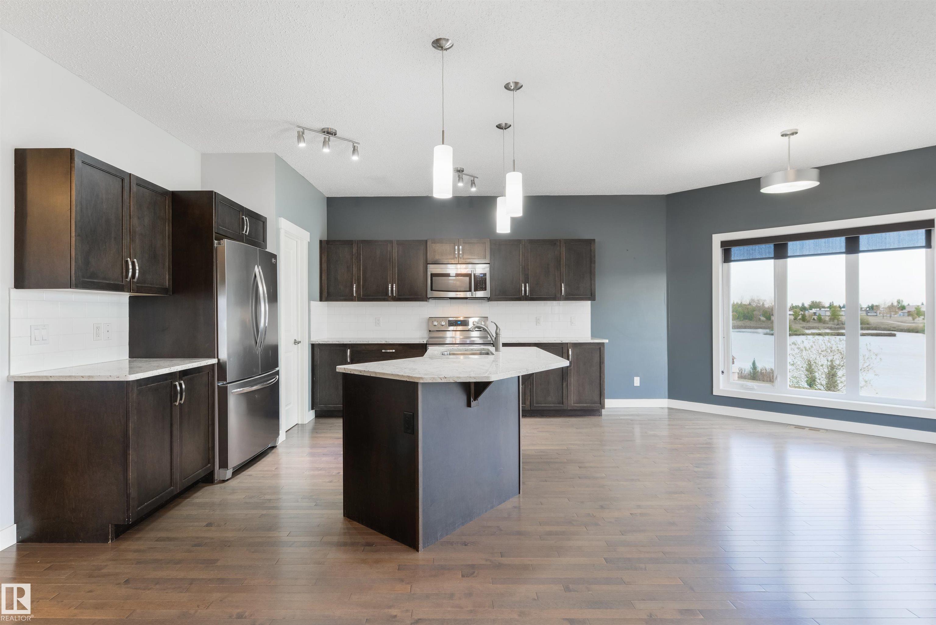 Photo 8 at 63 Dalquist Bay, Tribute, Leduc