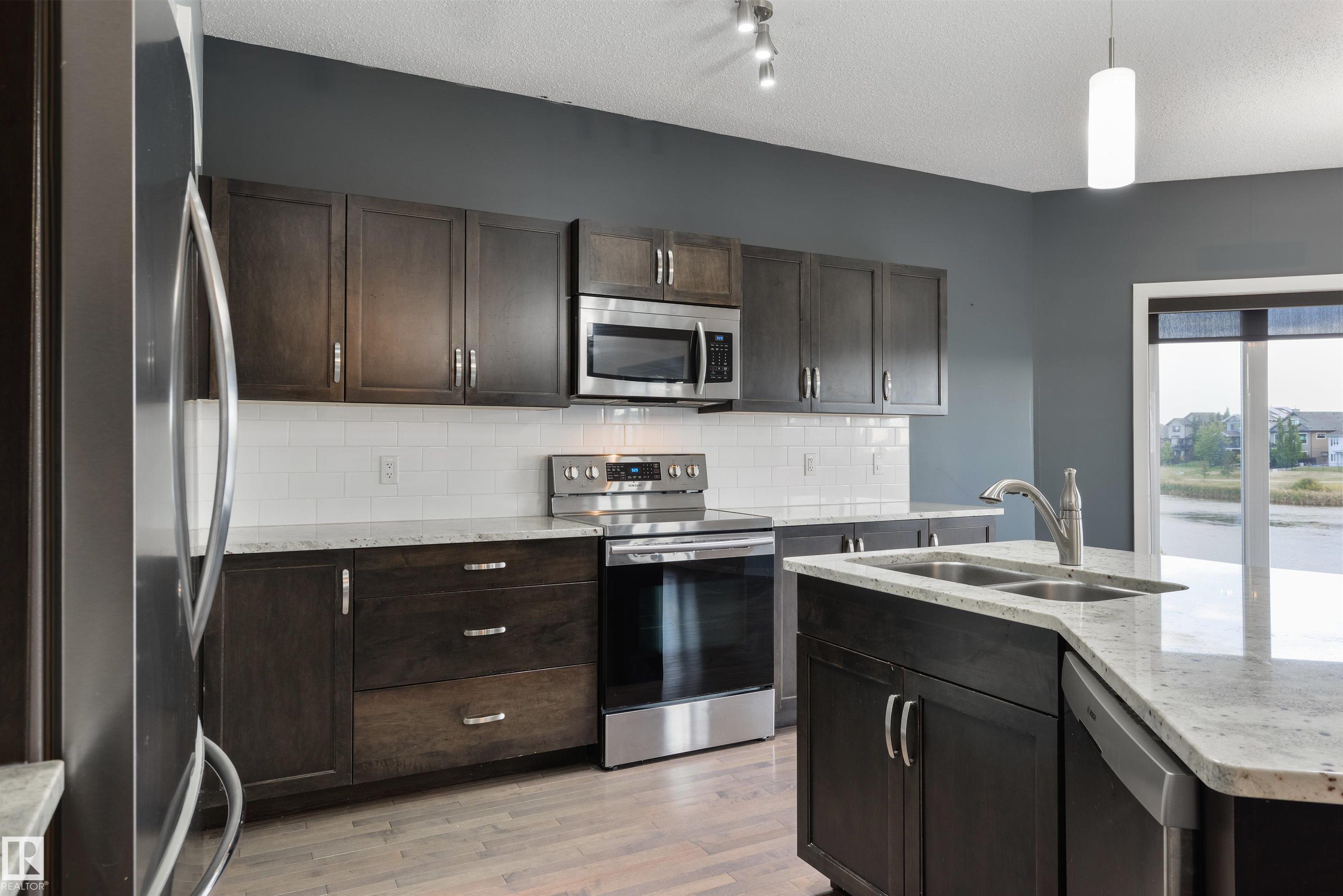 Photo 9 at 63 Dalquist Bay, Tribute, Leduc