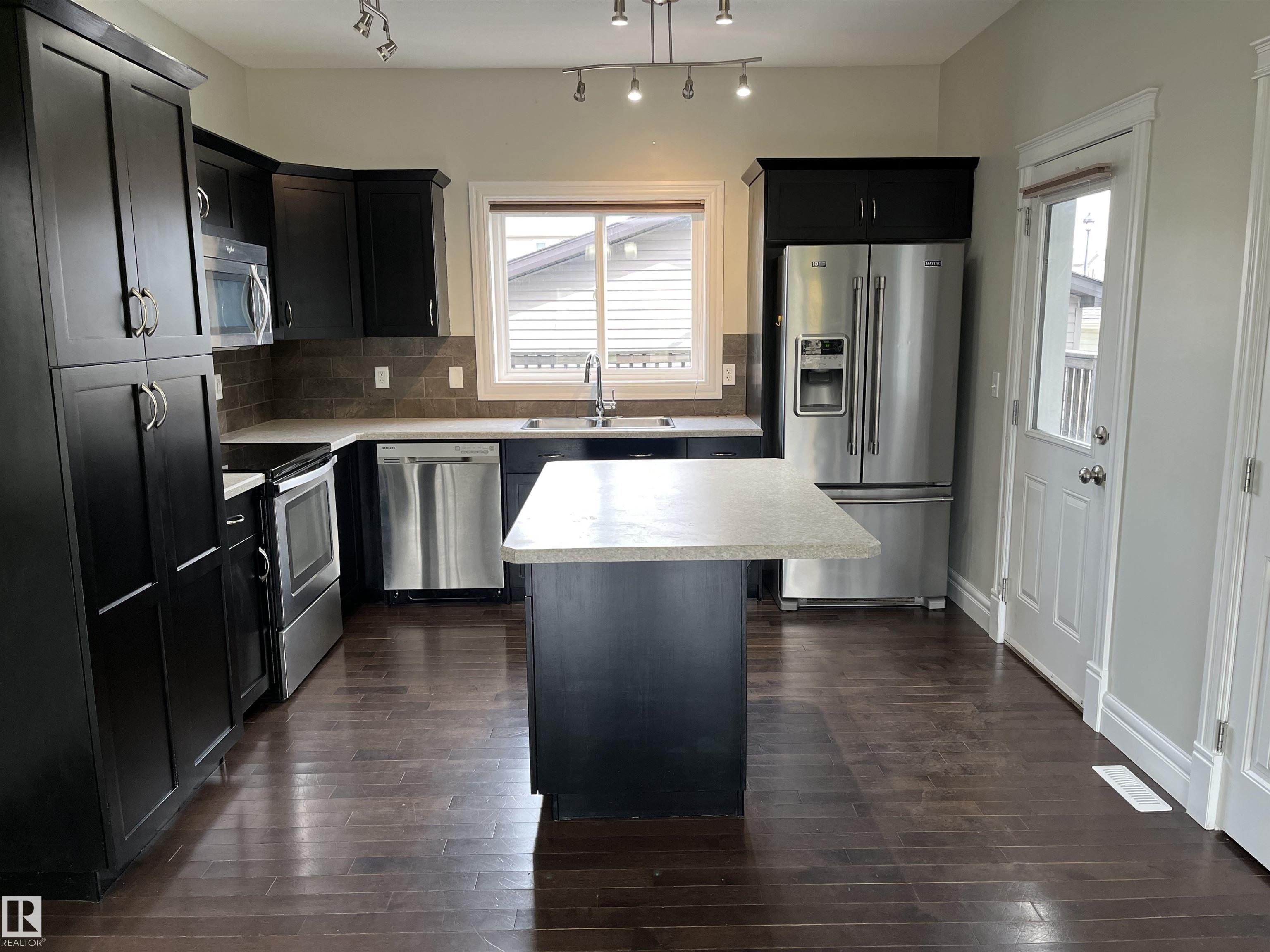 Photo 2 at 303 Sheridan Way, Suntree, Leduc