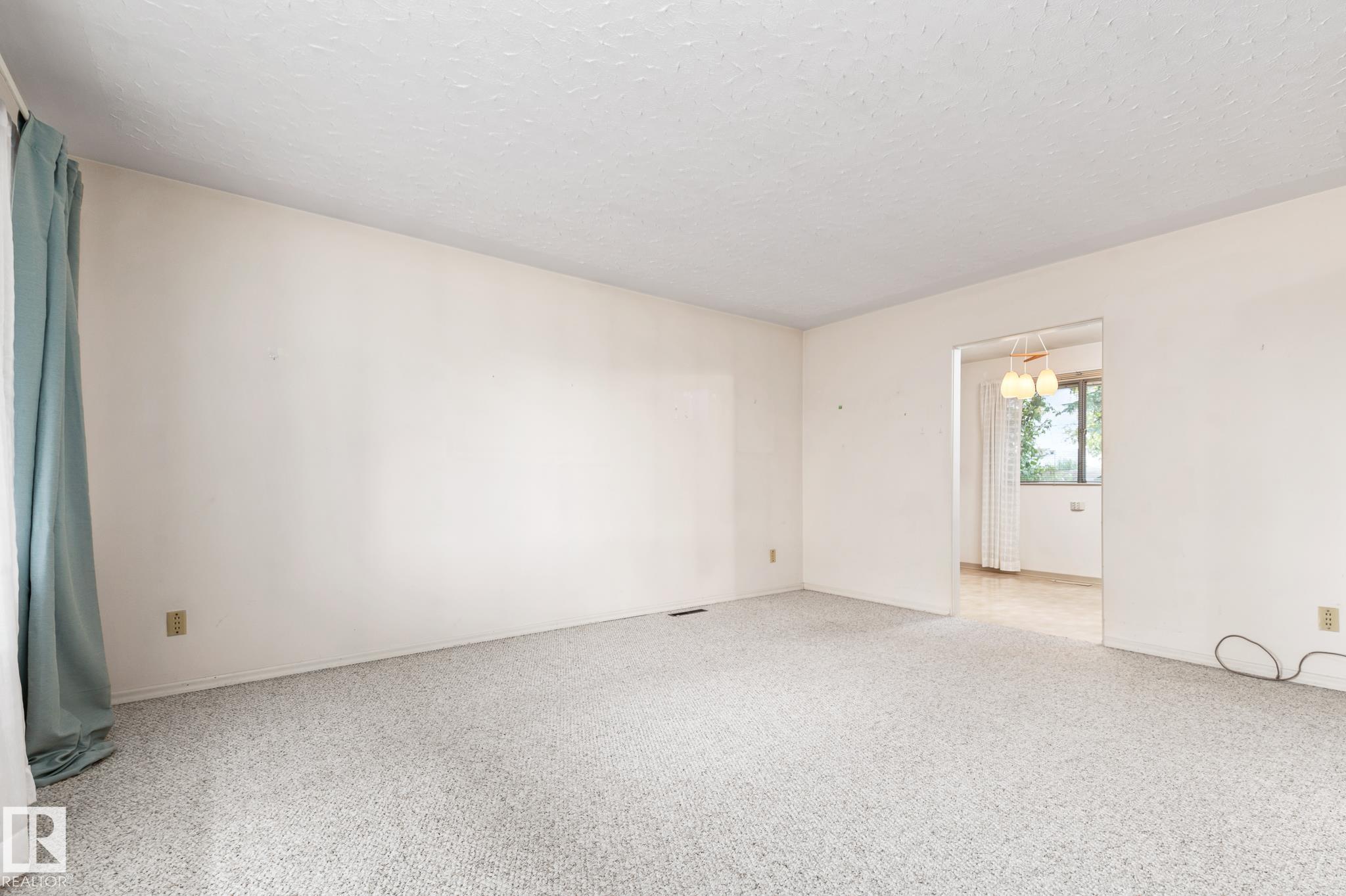 Photo 4 at 12419 135a Avenue NW, Kensington, Edmonton
