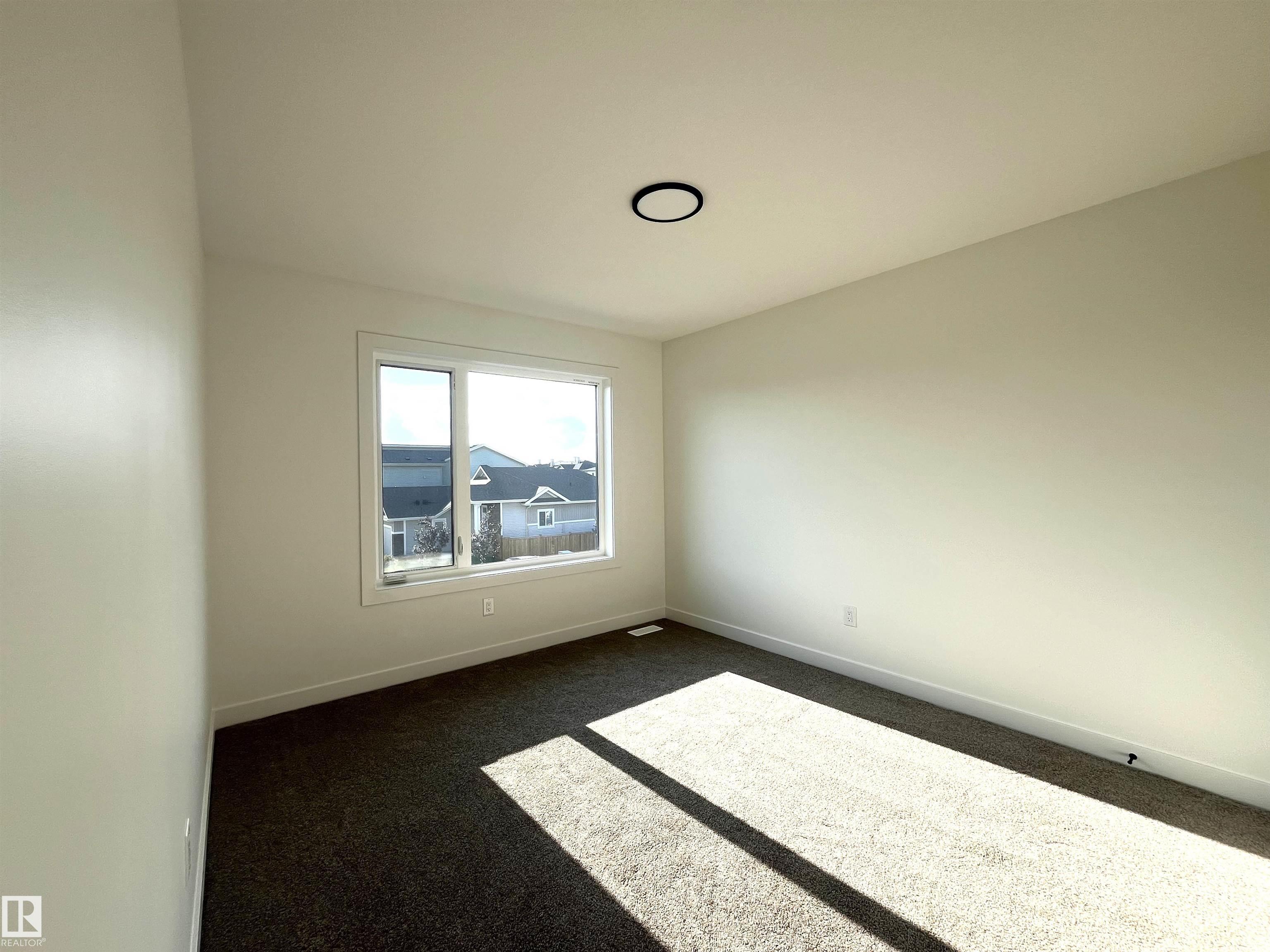 Photo 23 at 587 Boulder Wynd, Black Stone, Leduc