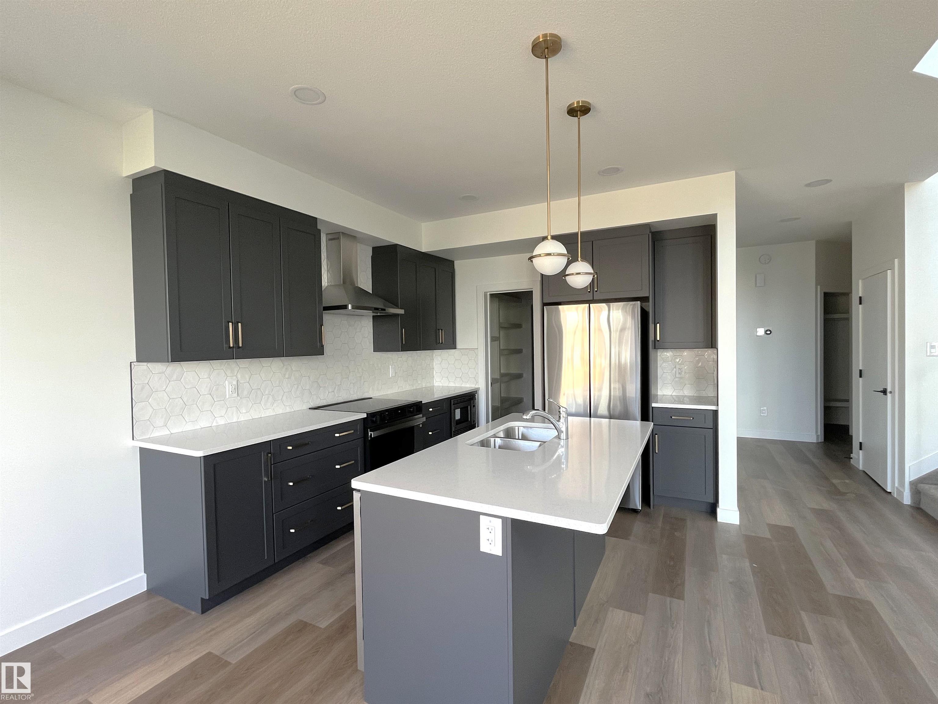 Photo 4 at 587 Boulder Wynd, Black Stone, Leduc