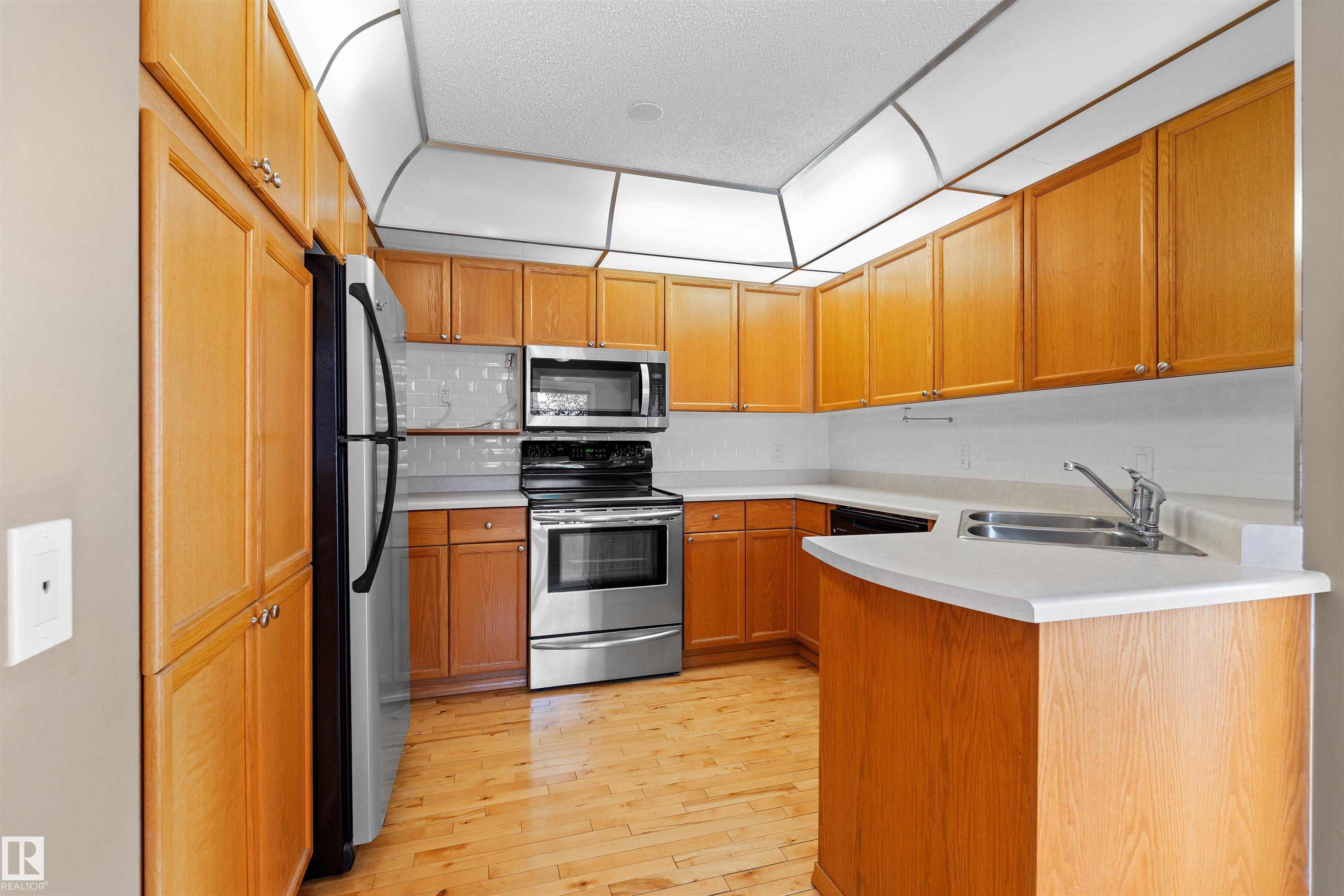 Photo 6 at 101 - 11115 9 Avenue NW, Twin Brooks, Edmonton