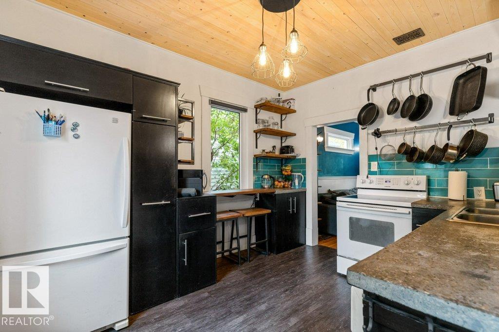 Photo 14 at 11215 67 Street NW, Highlands, Edmonton