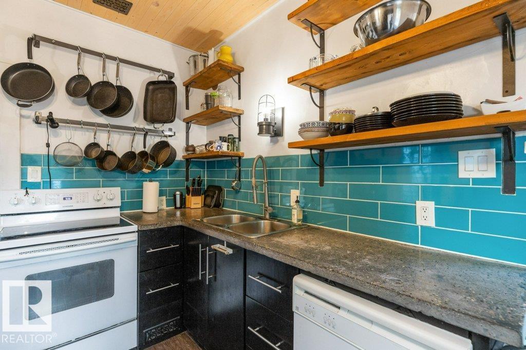 Photo 16 at 11215 67 Street NW, Highlands, Edmonton
