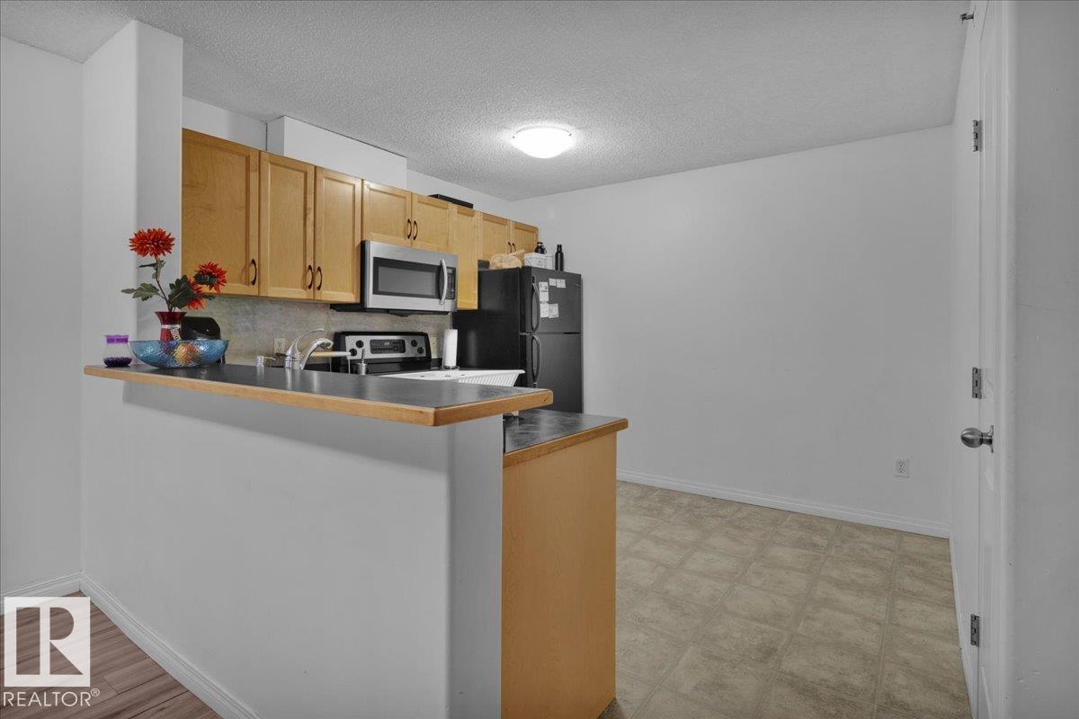 Photo 6 at 407 - 2305 35a Avenue NW, Wild Rose, Edmonton