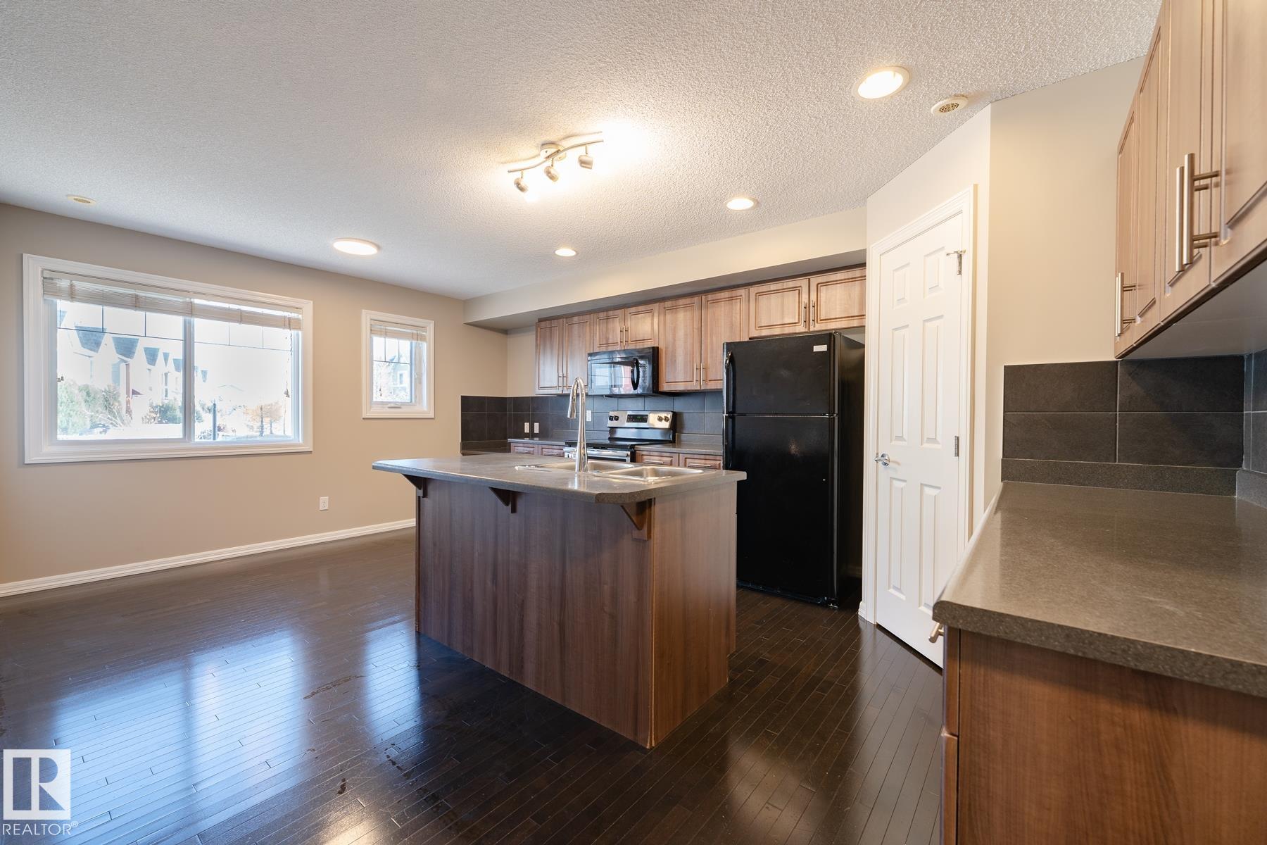 Photo 5 at 103 - 655 Tamarack Road NW, Tamarack, Edmonton