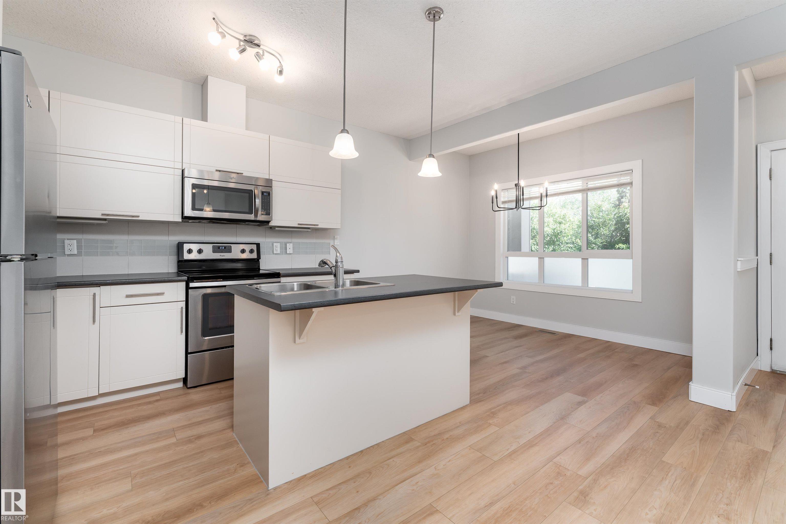 Photo 11 at 13019 132 Avenue NW, Athlone, Edmonton