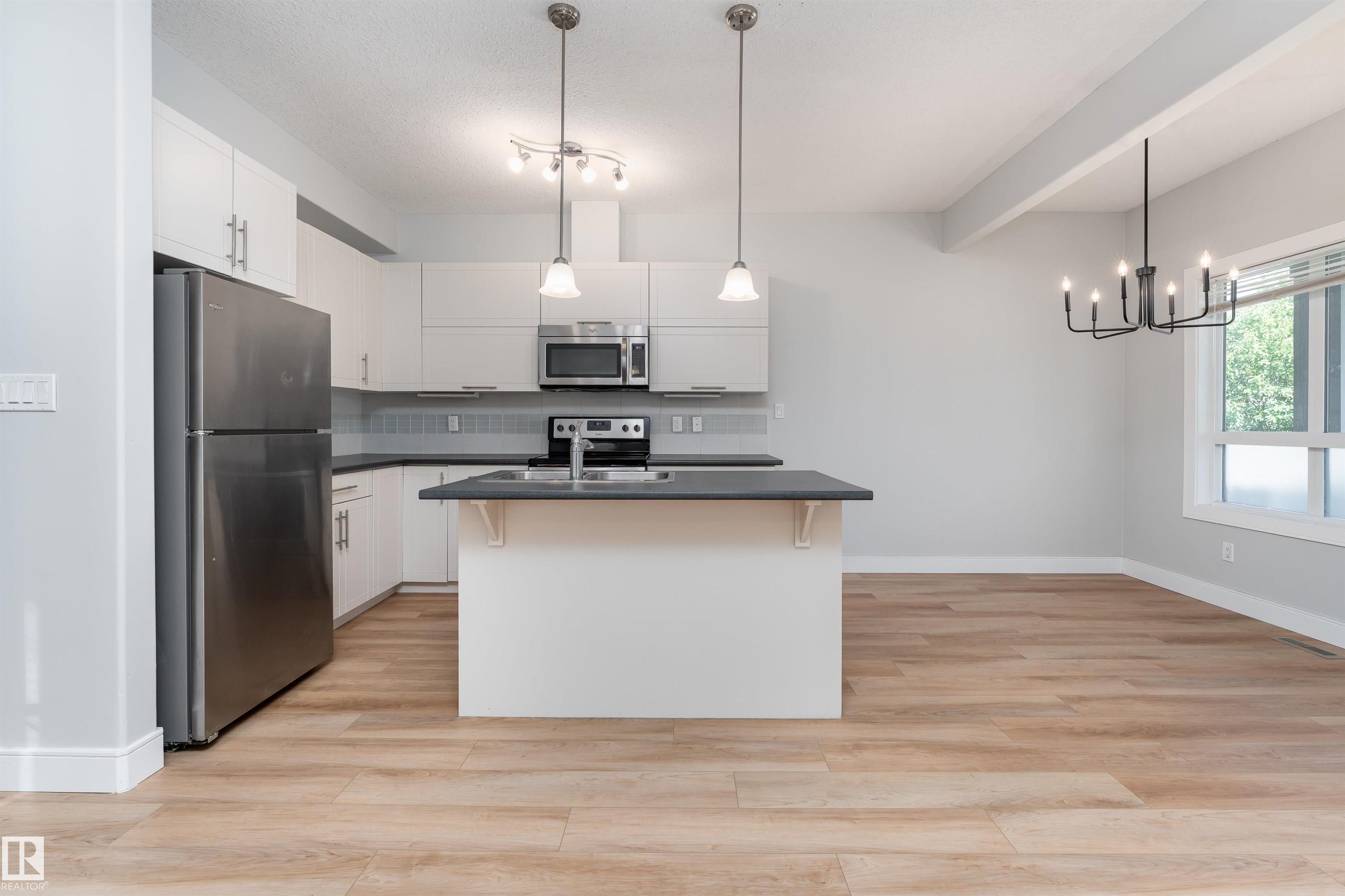Photo 8 at 13019 132 Avenue NW, Athlone, Edmonton