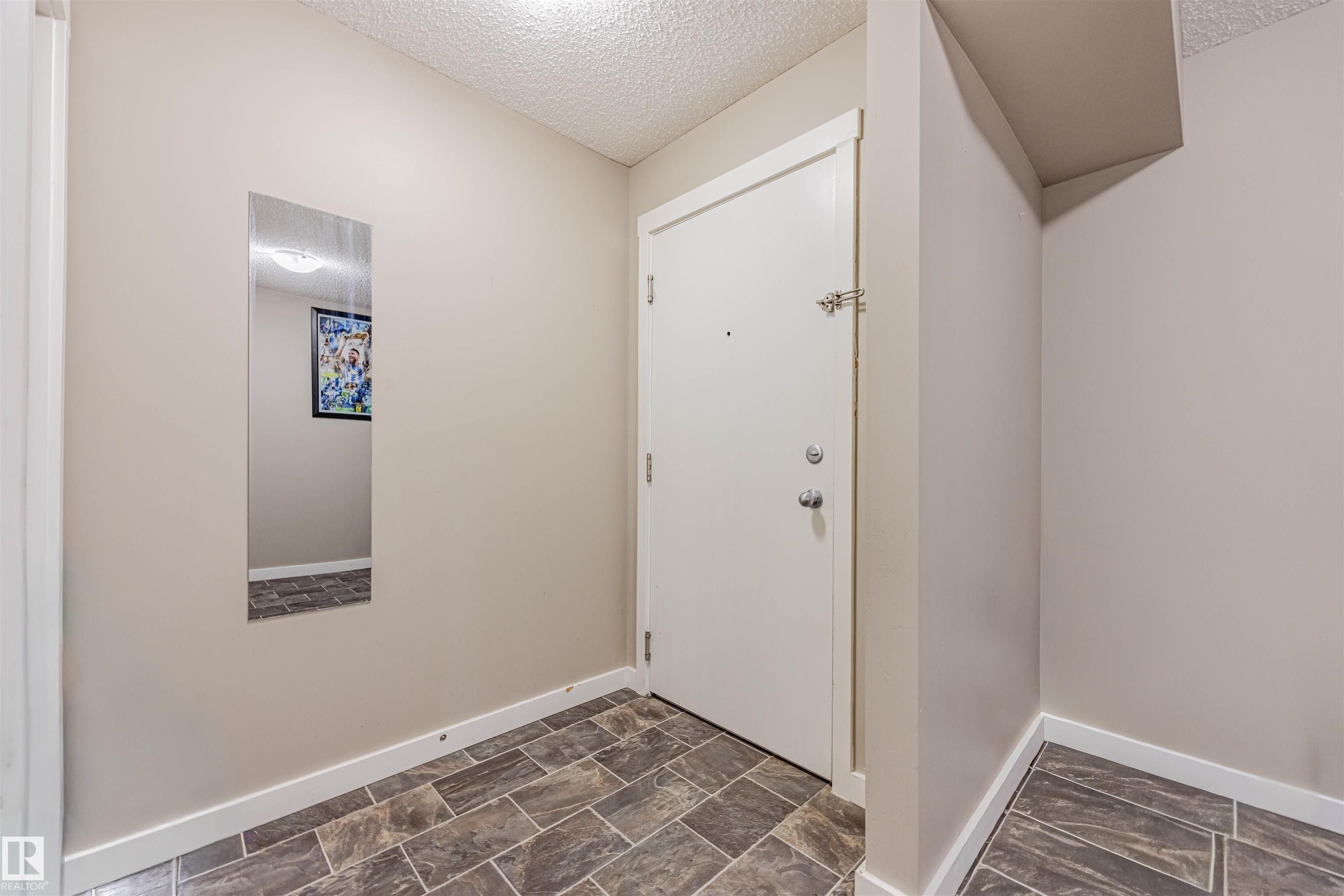 Photo 2 at 202 - 5816 Mullen Place NW, MacTaggart, Edmonton